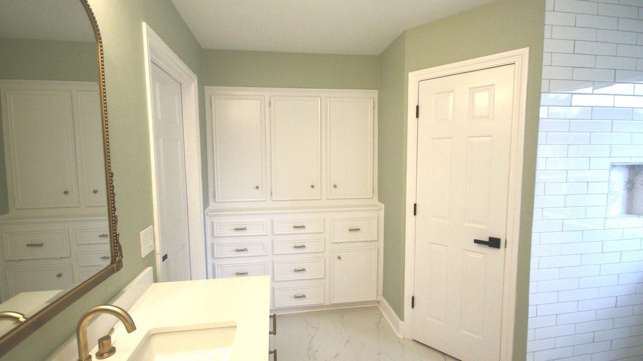 7827 Zilonis Court, Jersey Village, TX 77040 Expansive master bathroom with elegant built-ins and spacious his-and-hers walk-in closets.