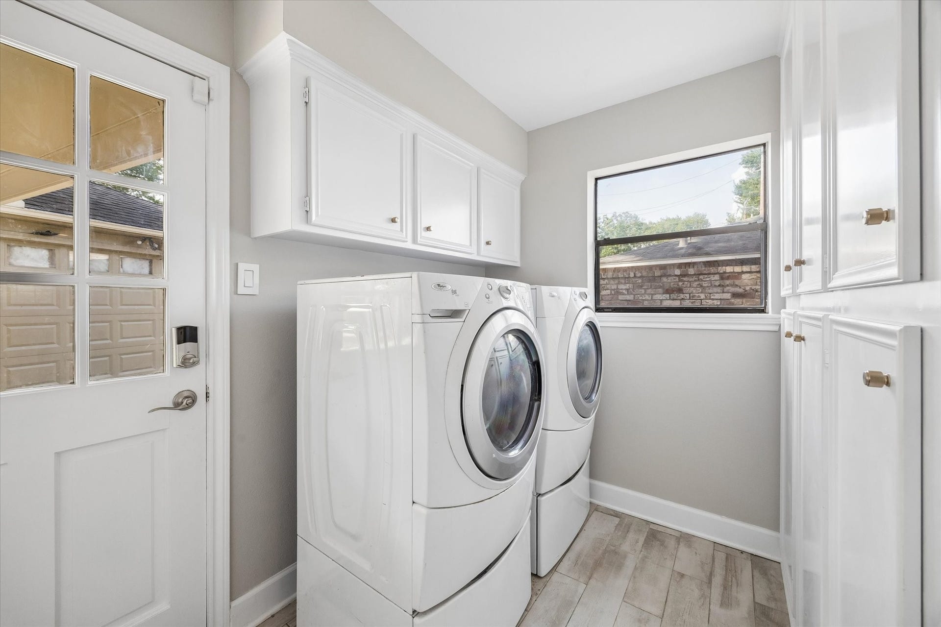 7827 Zilonis Court, Jersey Village, TX 77040 Utility room with built-ins