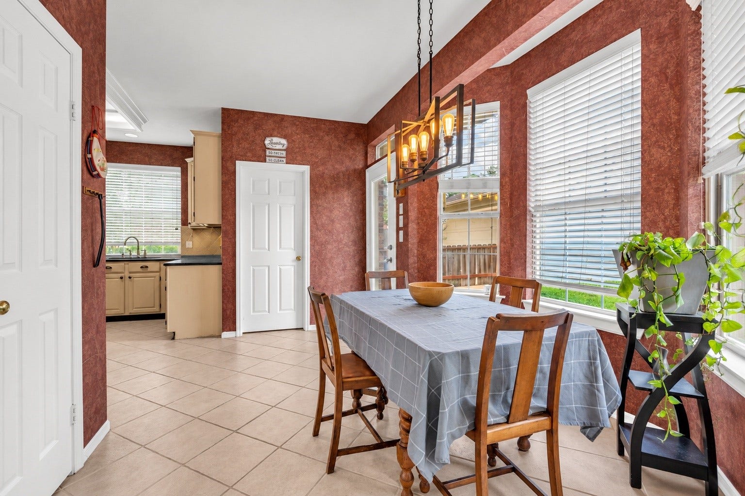 7914 Hickory Mill Court, Houston, TX 77095 Start your mornings in the charming breakfast nook, where a large picture window fills the space with natural light and offers a beautiful view of the backyardthe perfect setting to enjoy your morning coffee, a leisurely breakfast, or simply a quiet moment to begin your day.