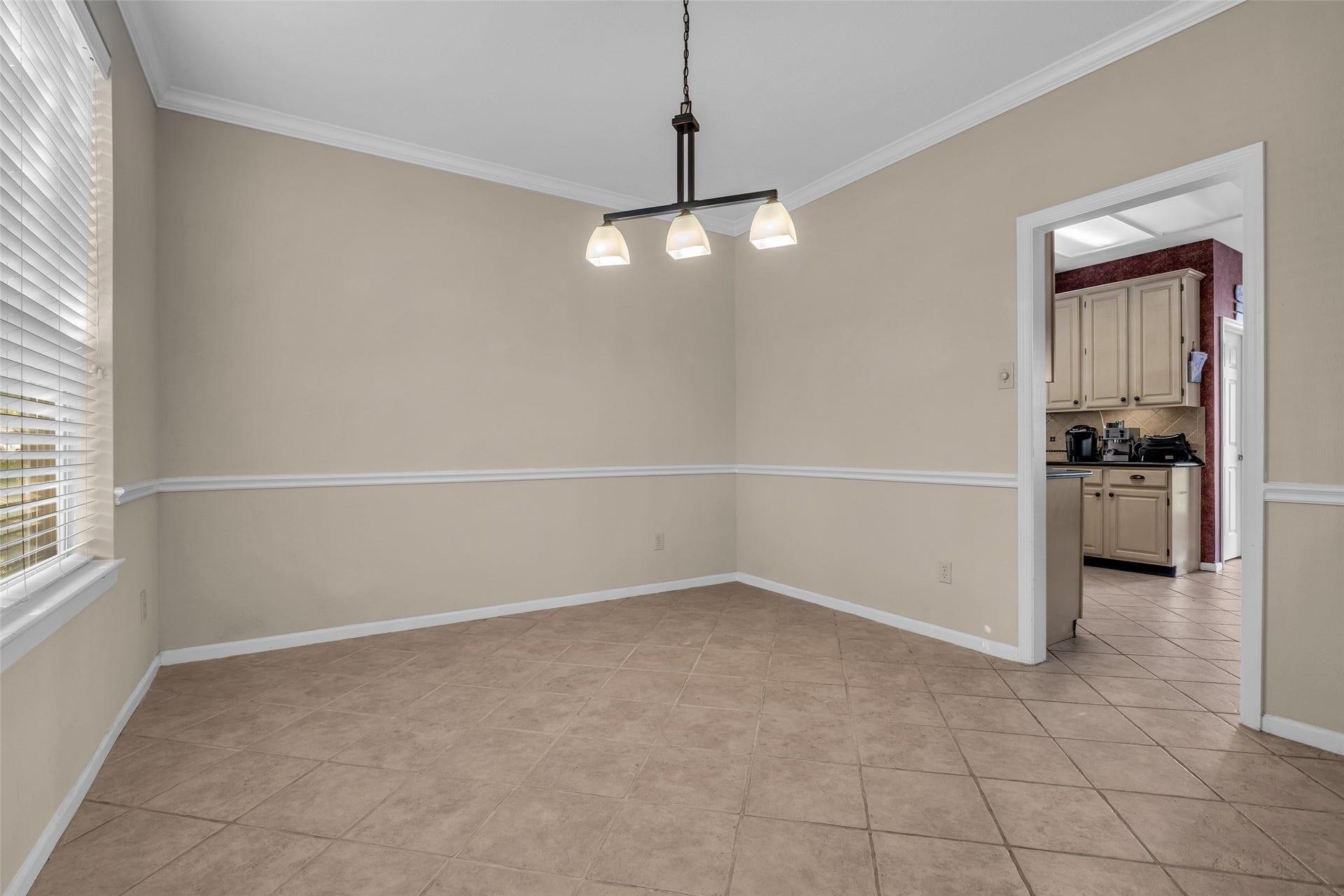 7914 Hickory Mill Court, Houston, TX 77095 Formal dining room with a pass thru to the kitchen.