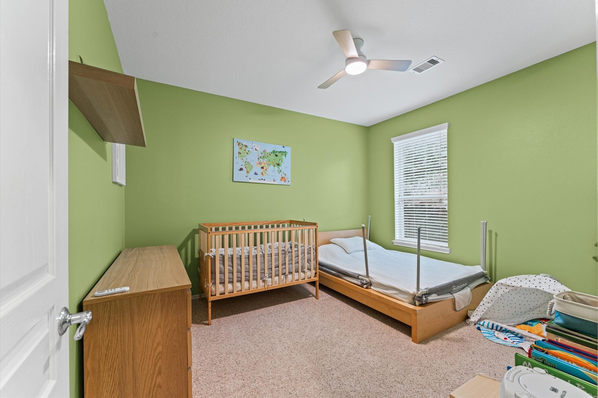 13423 Hartland Lake Lane, Houston, TX 77044 Bright and inviting bedroom with soothing green walls.