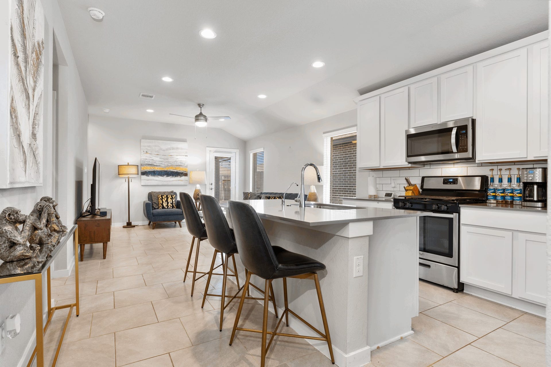 7510 Keystone Blossom Trail, Richmond, TX 77407 Grand Family Area with Large Title Floors, Chic Stainless Steel Ceiling Fan and more!