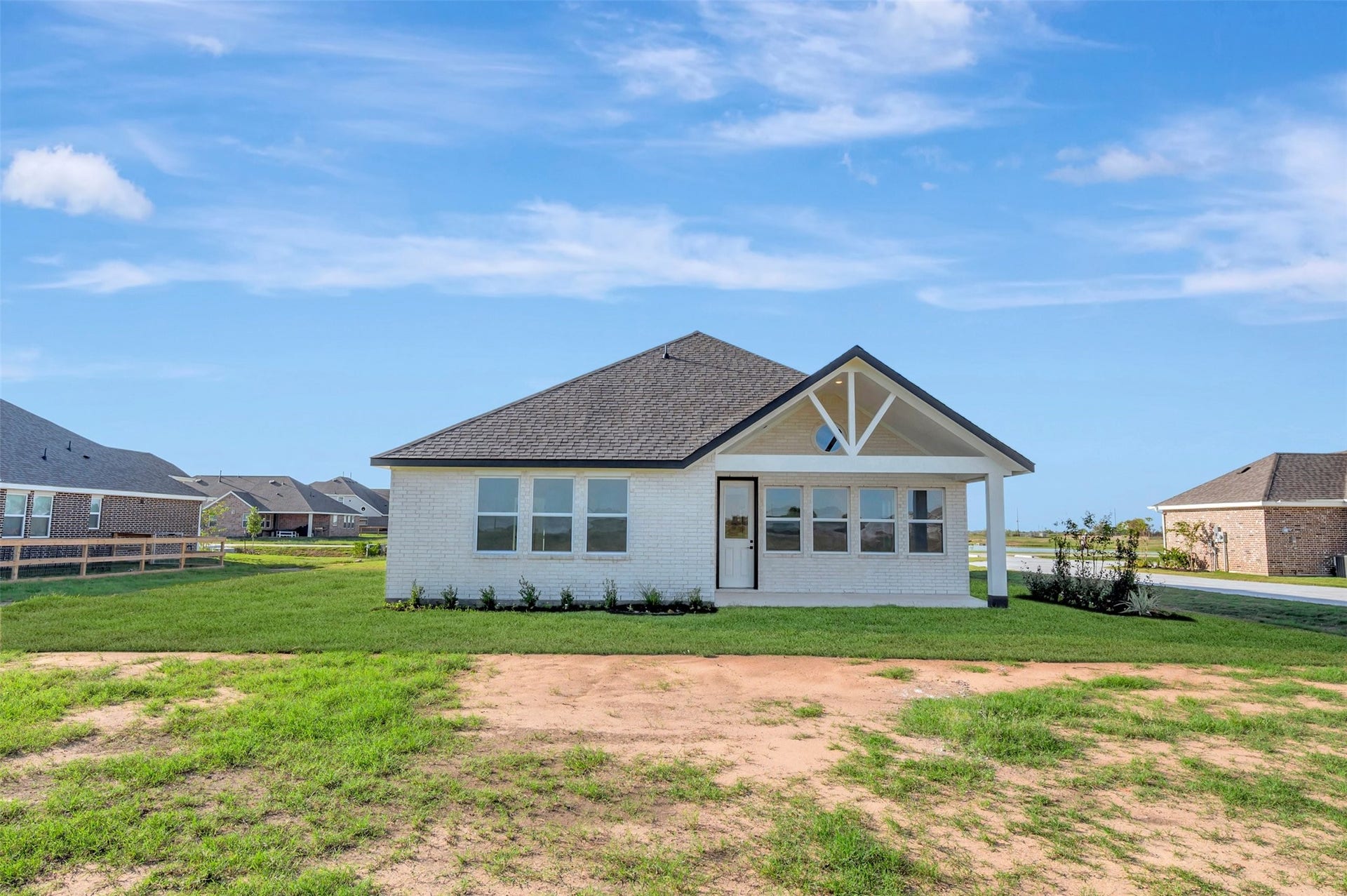 402 Cane Crossing Lake Drive, Sealy, TX 77474 Peaceful backyard with lush landscaping