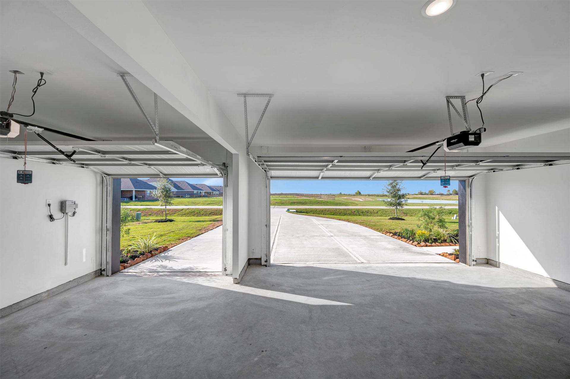 402 Cane Crossing Lake Drive, Sealy, TX 77474 3 car garage