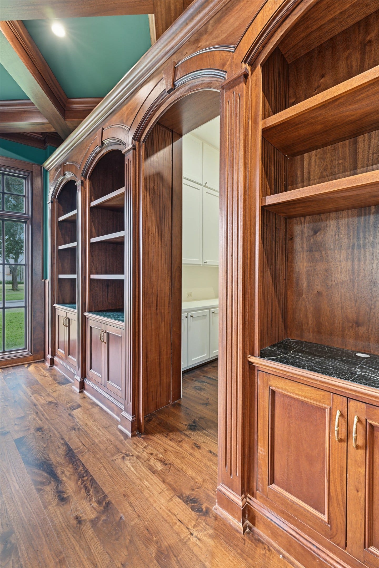 3223 Albans Road, West University Place, TX 77005 Behind a hidden door opens to a private office with custom built-ins and even more storage.
