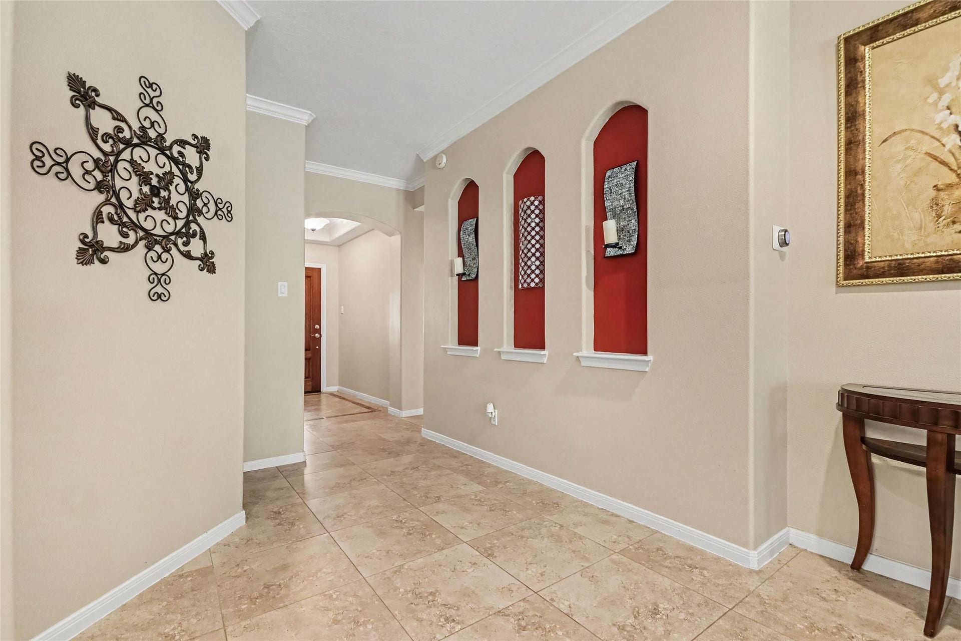213 Rippling Creek Lane, Alvin, TX 77511 No shortage of decorative touches here, lovely wall niches, trim and ceiling detail