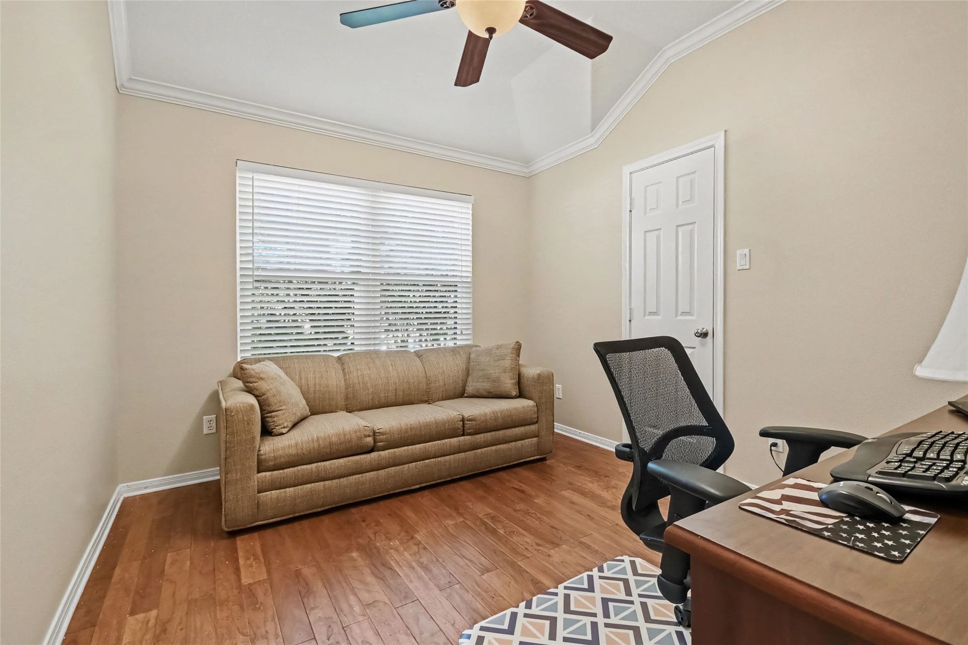 213 Rippling Creek Lane, Alvin, TX 77511 3rd bedroom being used as a home office, wood floors