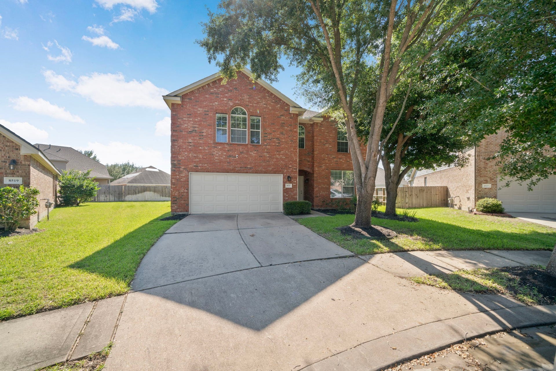 8523 Sweetstone Field Court, Cypress, TX 77433 Spacious driveway and attractive curb appeal.