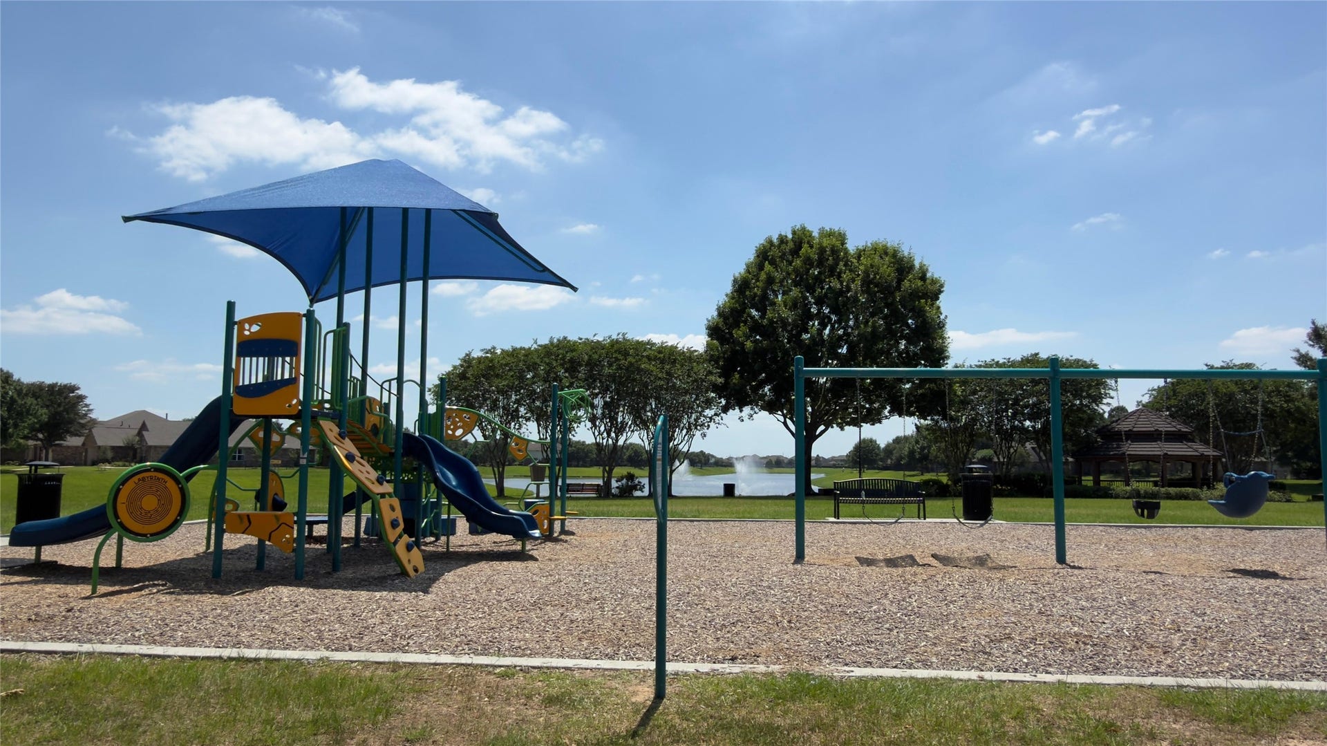 8523 Sweetstone Field Court, Cypress, TX 77433 Community playground area for outdoor fun and activities.