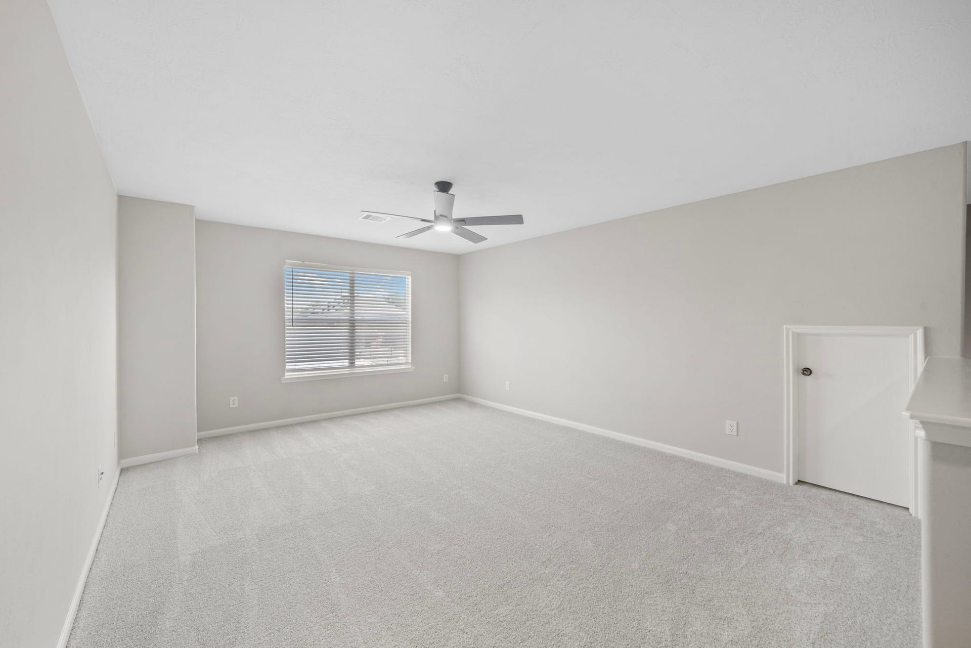 8523 Sweetstone Field Court, Cypress, TX 77433 Flexible upstairs bonus room ideal for office, playroom, or media space.