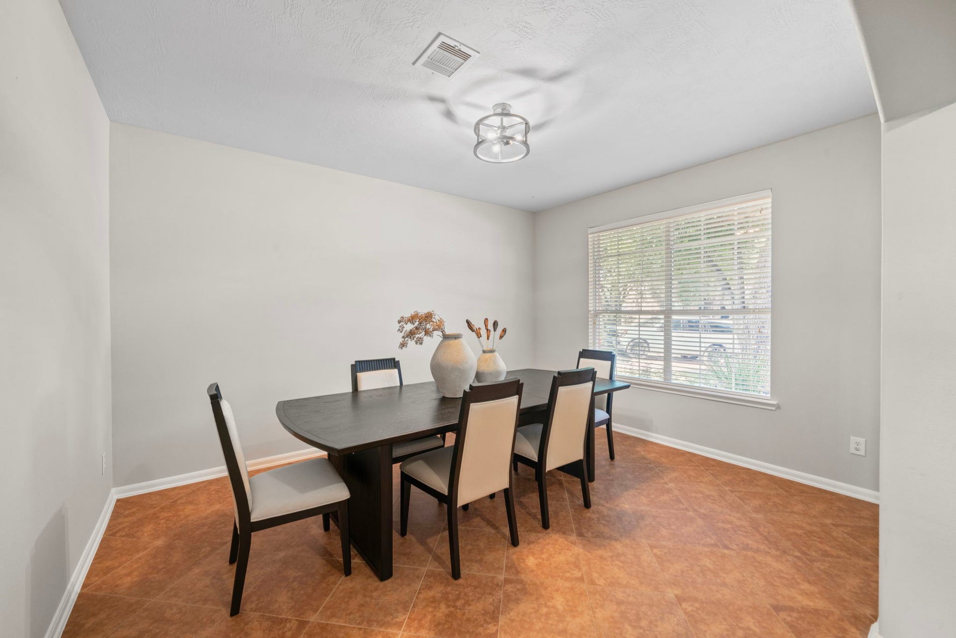 8523 Sweetstone Field Court, Cypress, TX 77433 Spacious dining room with natural light.