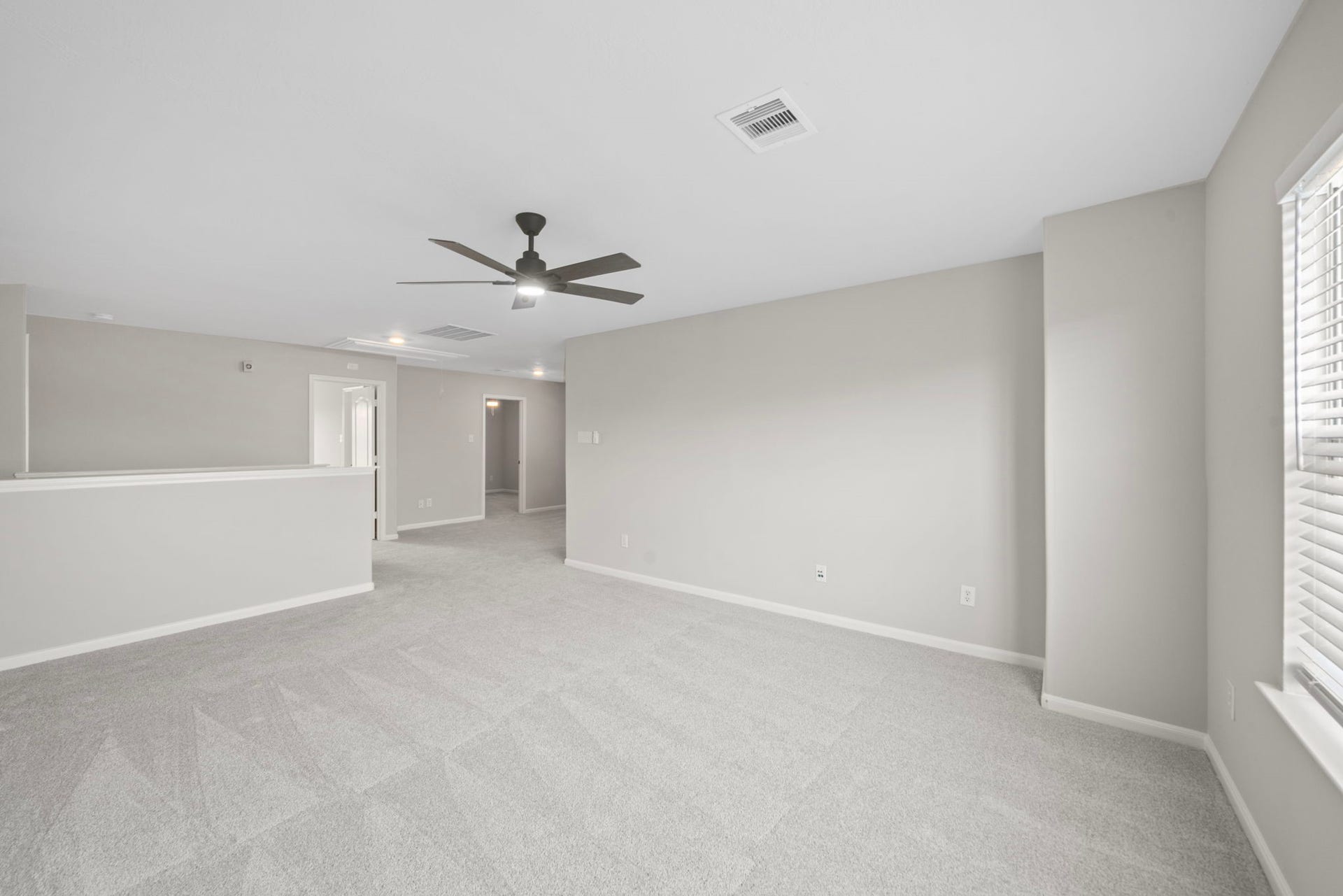 8523 Sweetstone Field Court, Cypress, TX 77433 Spacious upstairs game room perfect for entertaining or movie nights.