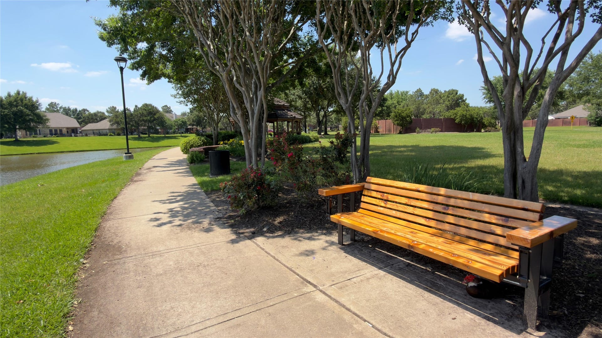 8523 Sweetstone Field Court, Cypress, TX 77433 Peaceful community seating area surrounded by nature.