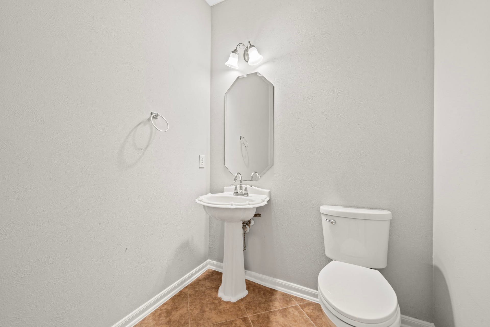 8523 Sweetstone Field Court, Cypress, TX 77433 Convenient first-floor powder room.