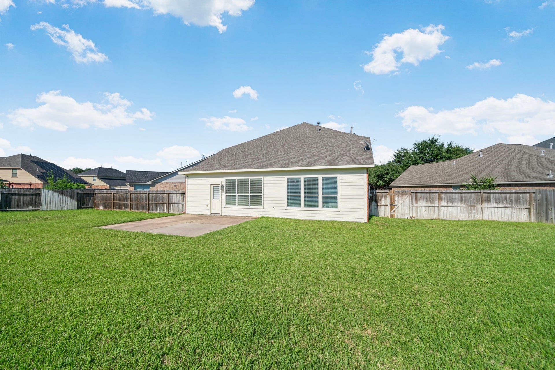8523 Sweetstone Field Court, Cypress, TX 77433 Expansive backyard with plenty of room for a pool or outdoor entertaining.