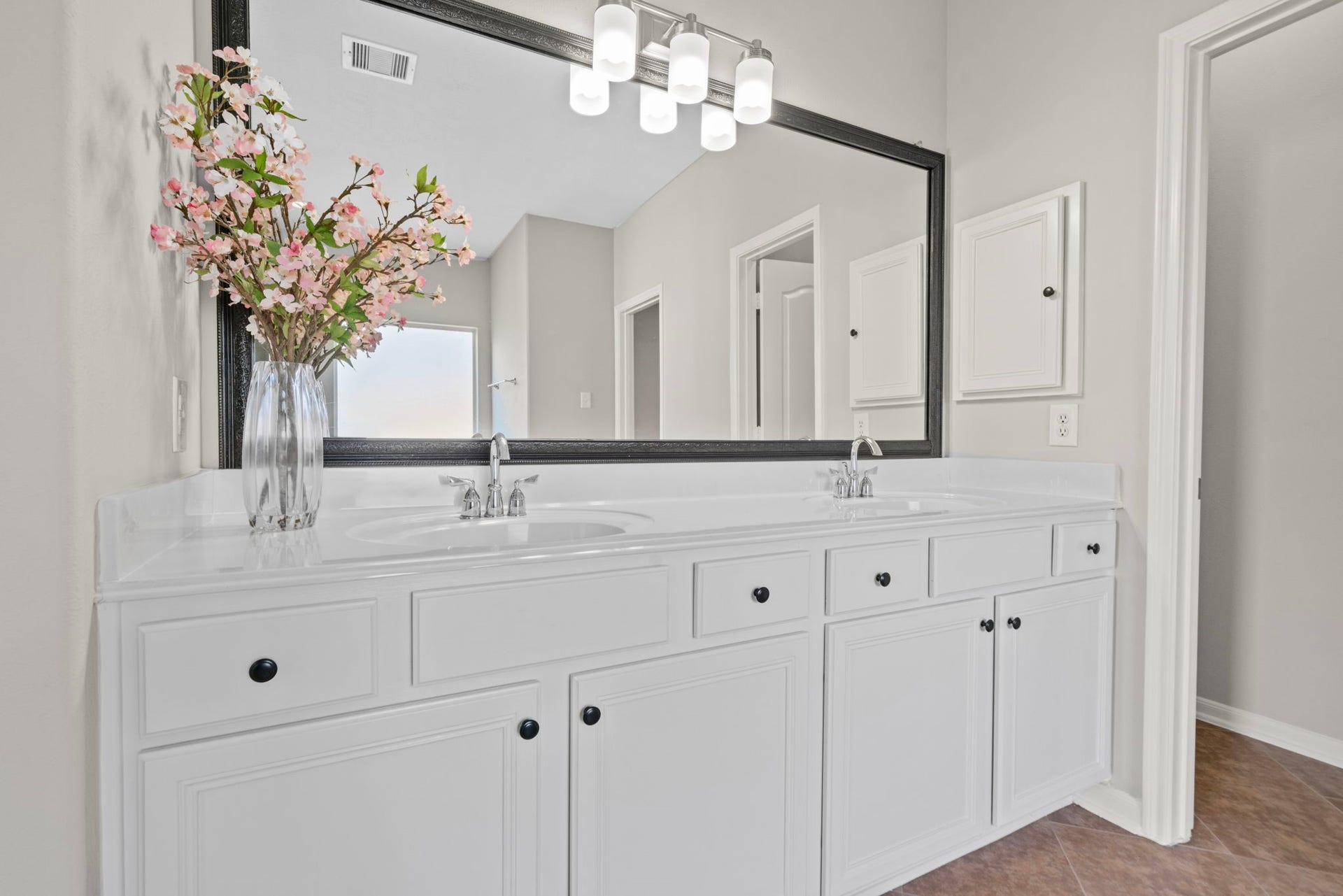 8523 Sweetstone Field Court, Cypress, TX 77433 Double sink vanity in the primary bathroom.