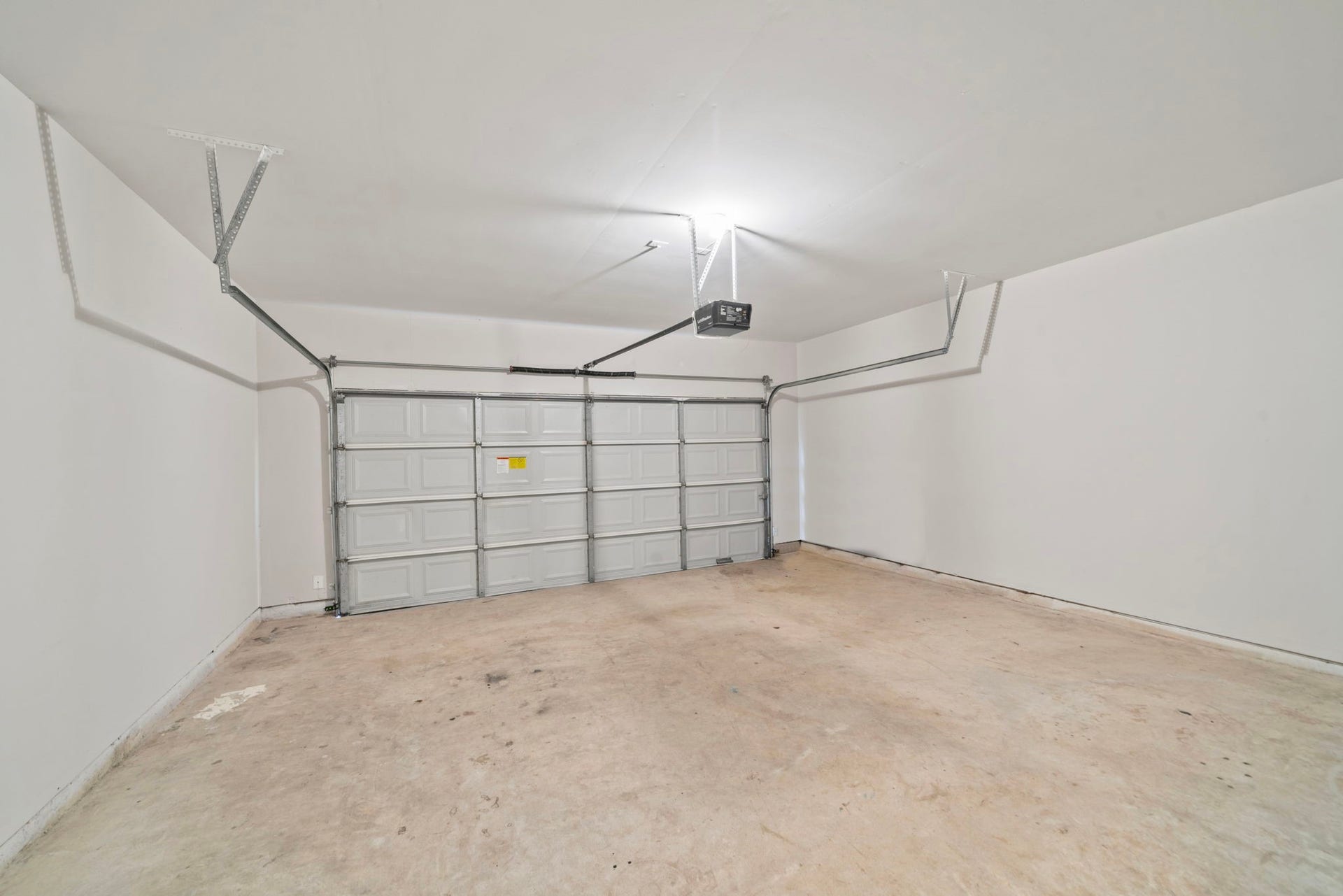 8523 Sweetstone Field Court, Cypress, TX 77433 Spacious two-car garage with additional storage space