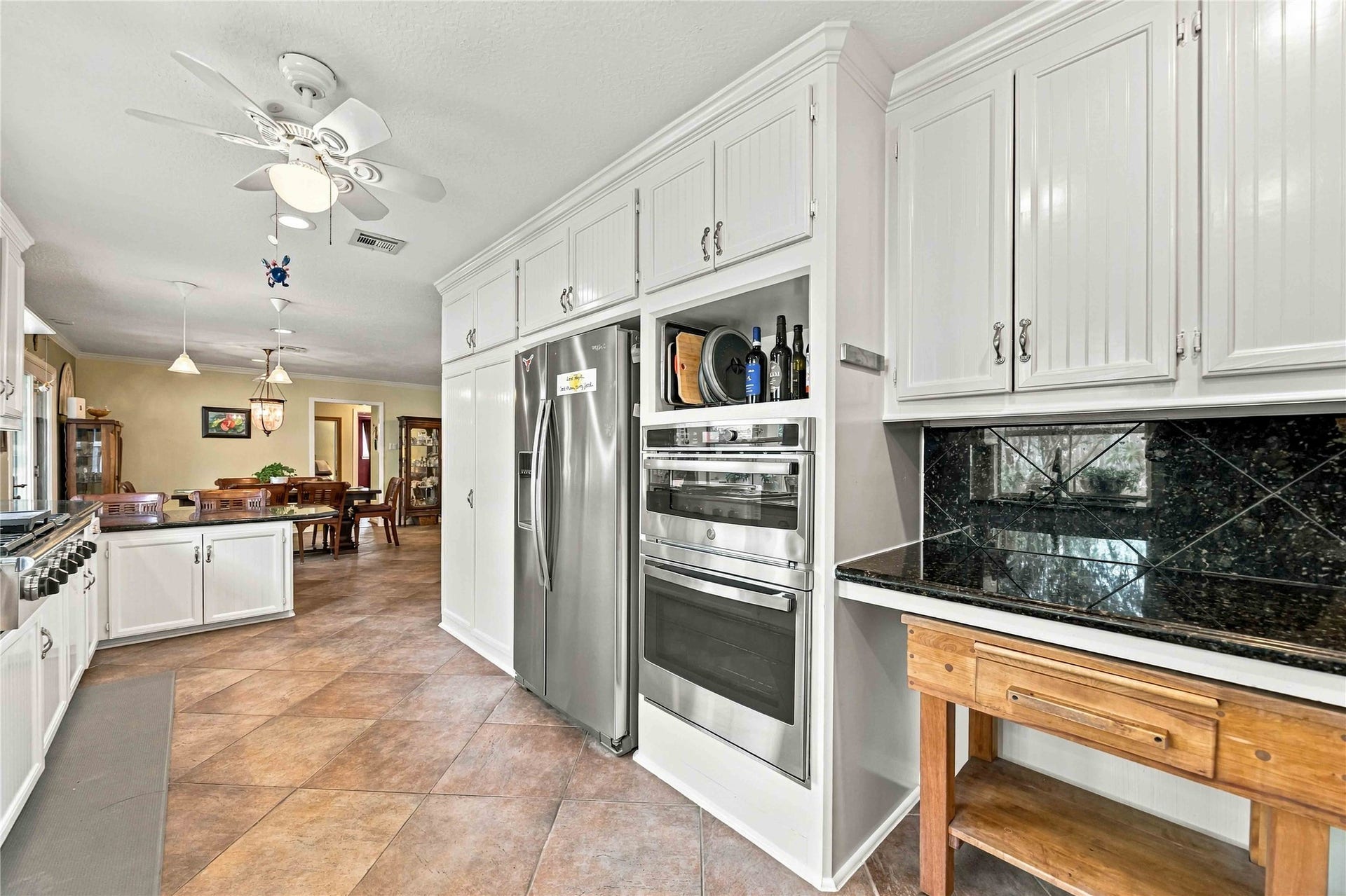 Custom butcher block designed specifically for the space provides additional prep and workspace.