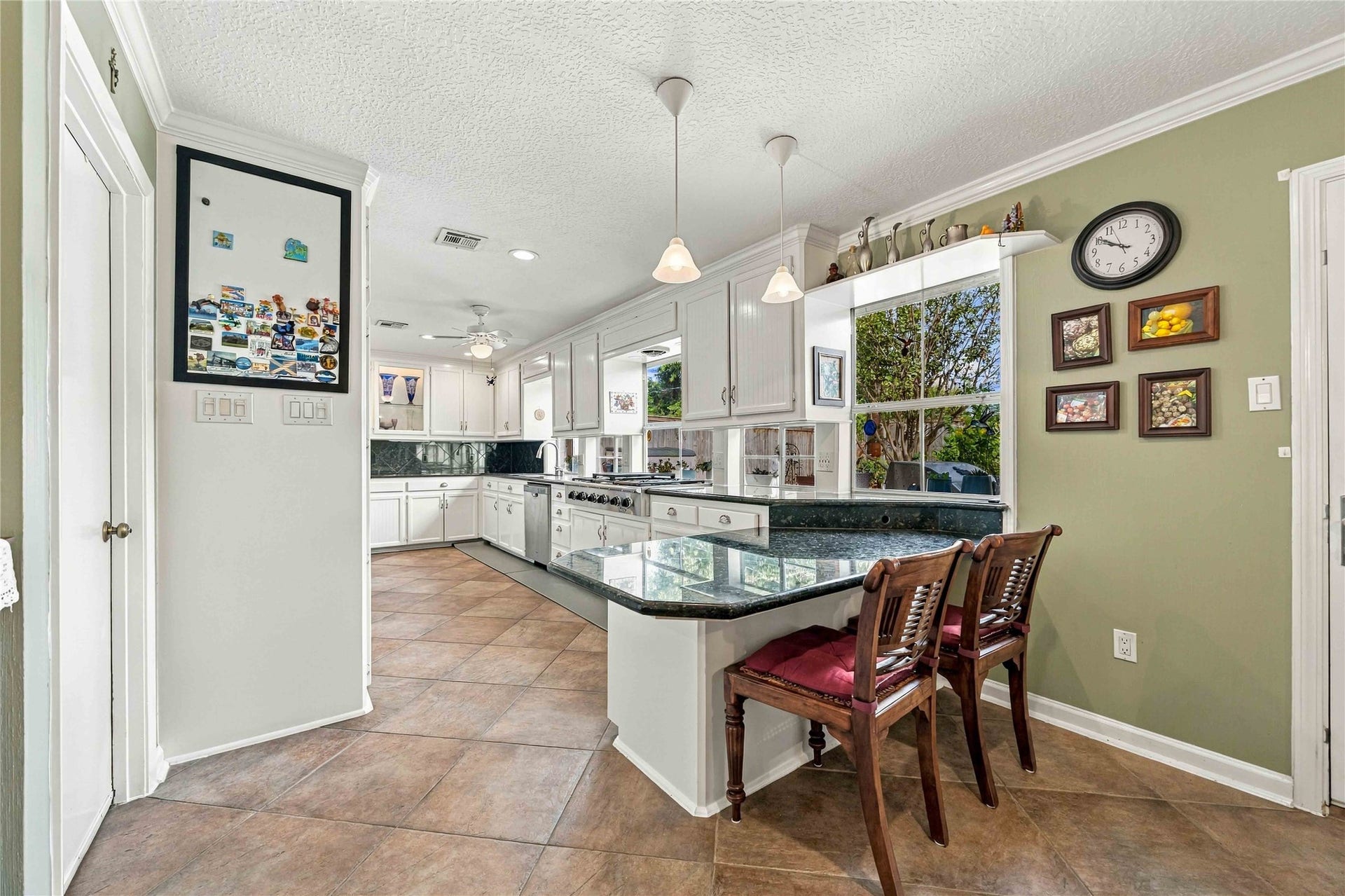 Another view of the breakfast bar, providing additional counter space that can also serve as a convenient workspace.