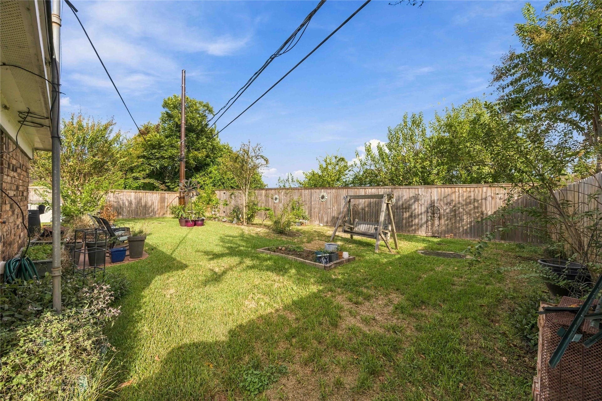 With no back neighbors, the backyard feels open and offers added privacy.