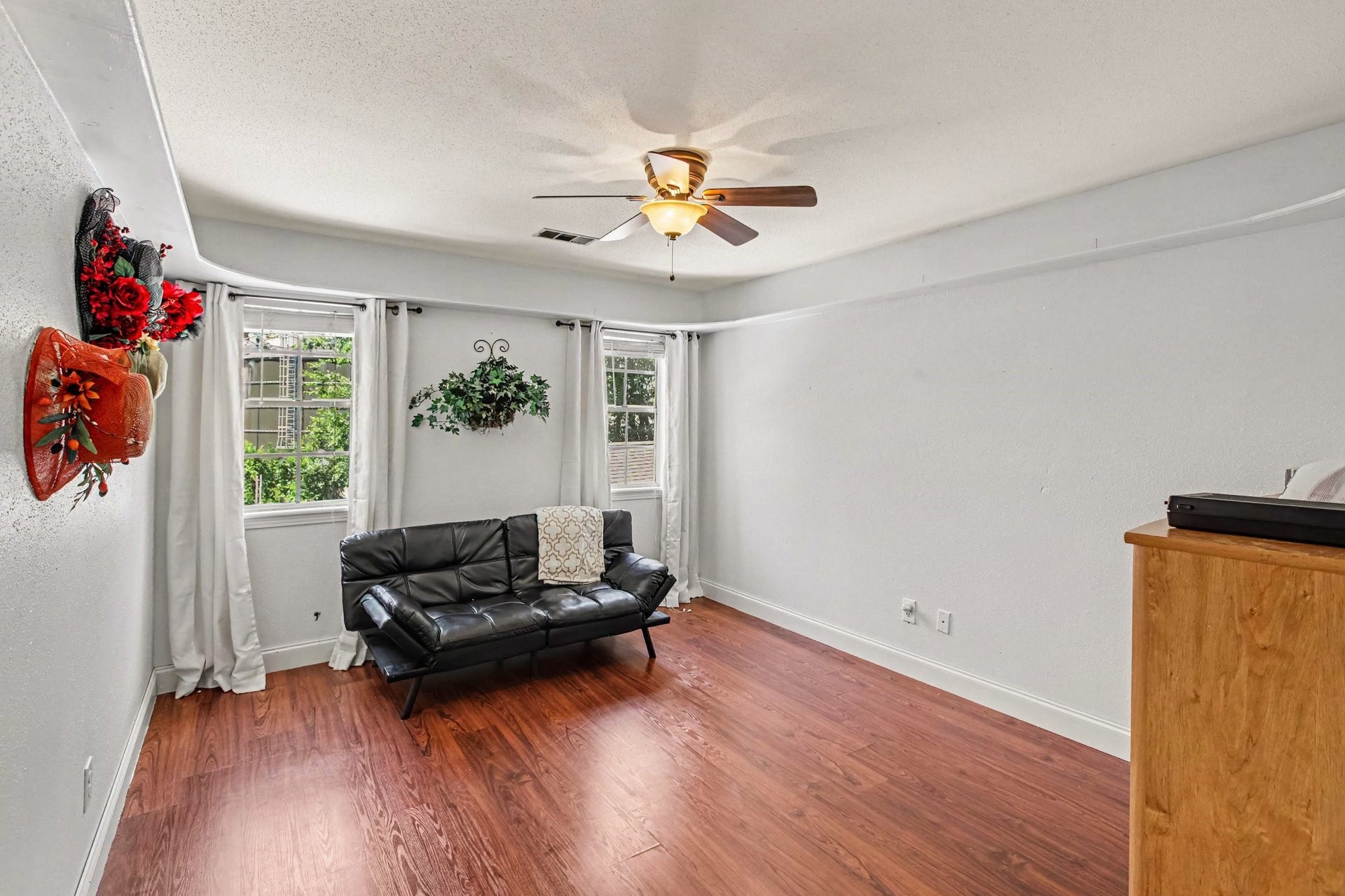 One of two upstairs bedrooms both offer generous closet space