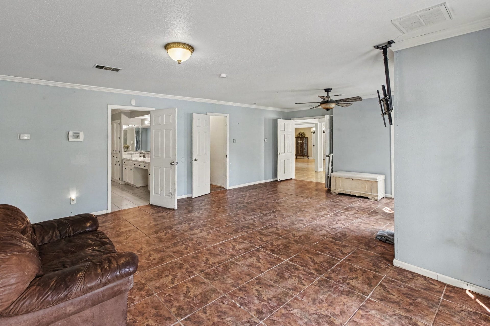 The downstairs primary bedroom is enormous