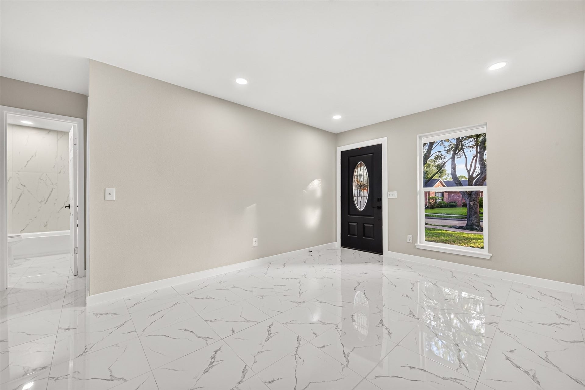 Den - Greeted with new white tiles & fresh interior paint