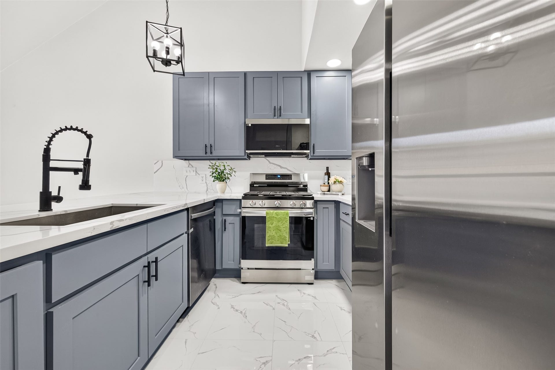 All new modern finishes with quartz countertop &  SS appliances