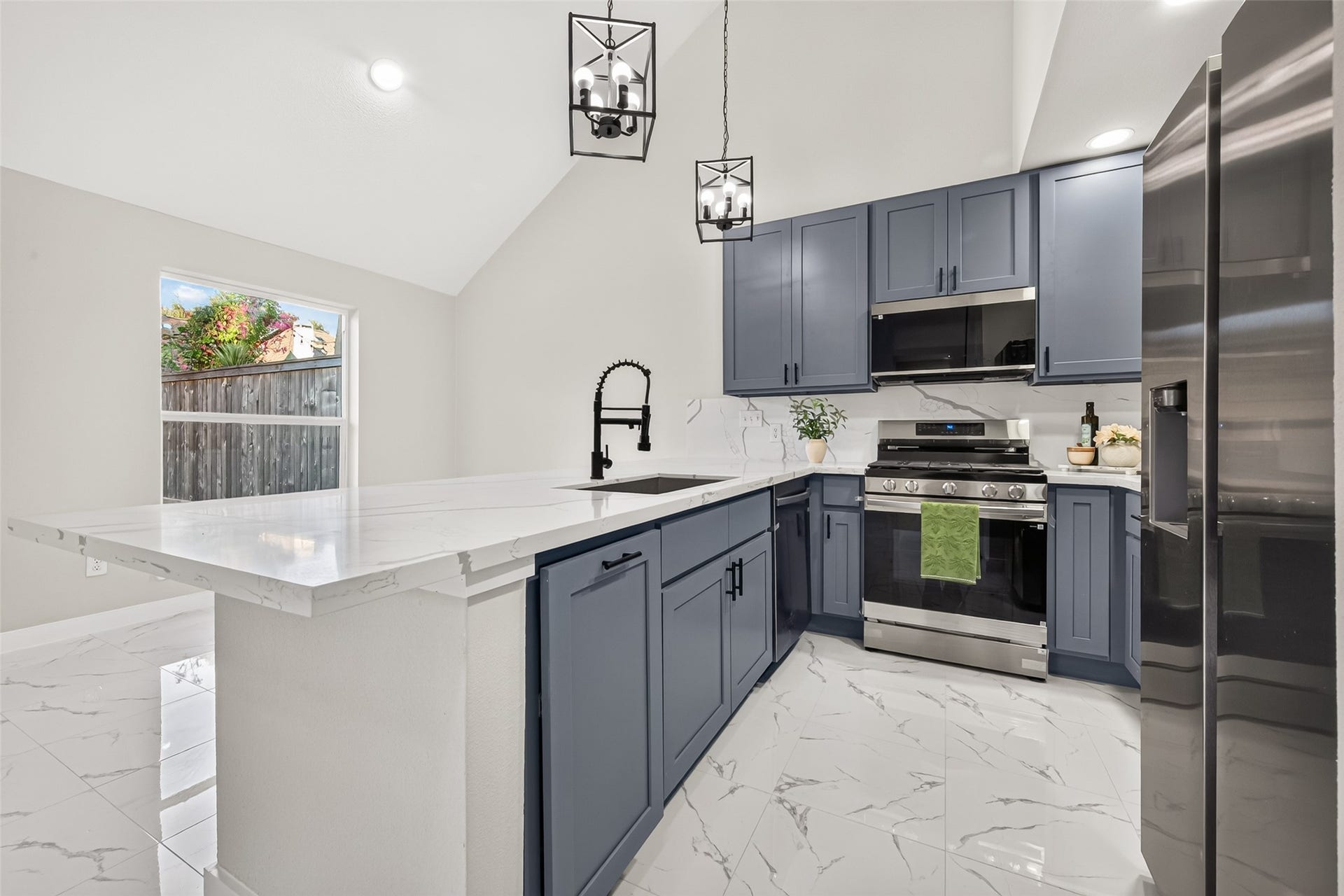 All new modern finishes with quartz countertop &  SS appliances
