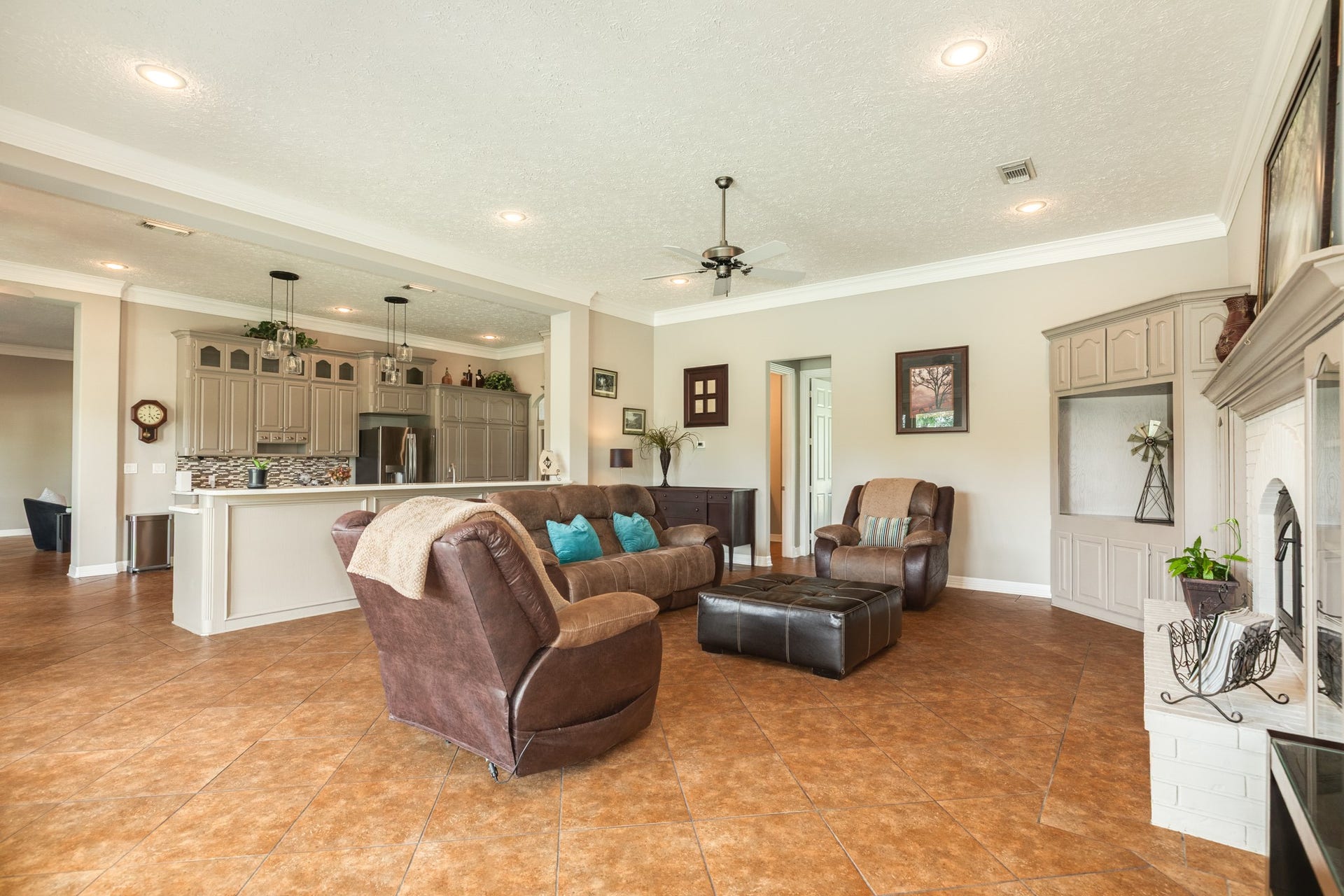 16337 County Road 171, Danbury, TX 77534 Another view of the second living area, highlighting its genorous size and seamless connection to the kitchen, creating an open functional space ideal for everyday living and entertaining.