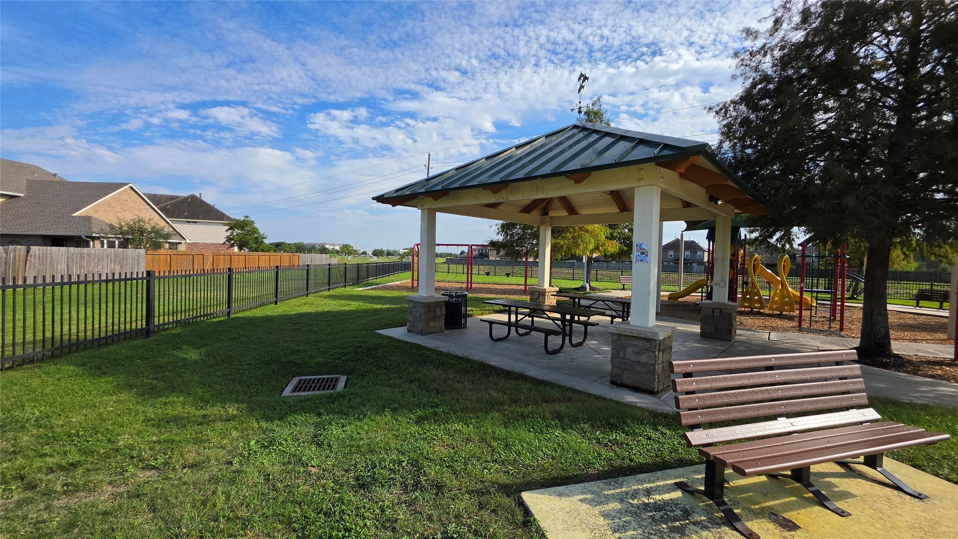 The covered pavilion offers a great location for a small gathering AND it has power! You'll have a front row seat to watch the kids play at the playground.