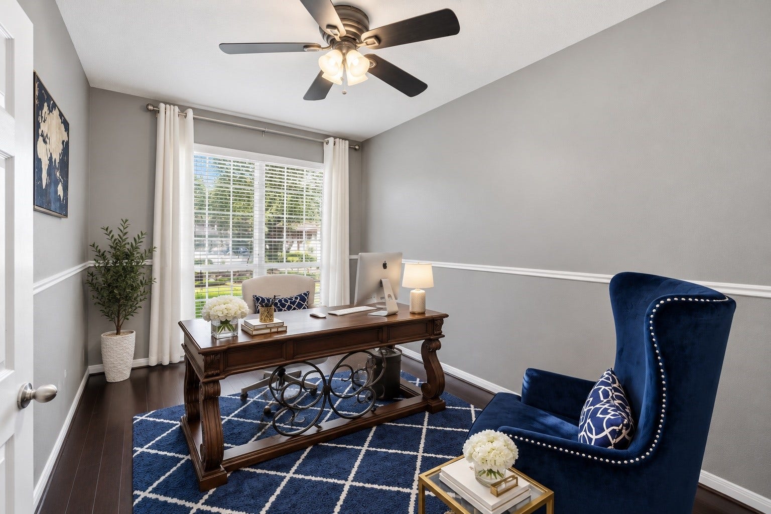 Enjoy working from home in your elegant Home Office! That beautiful wood floor continues here and is accented by ample natural light and warm colors.