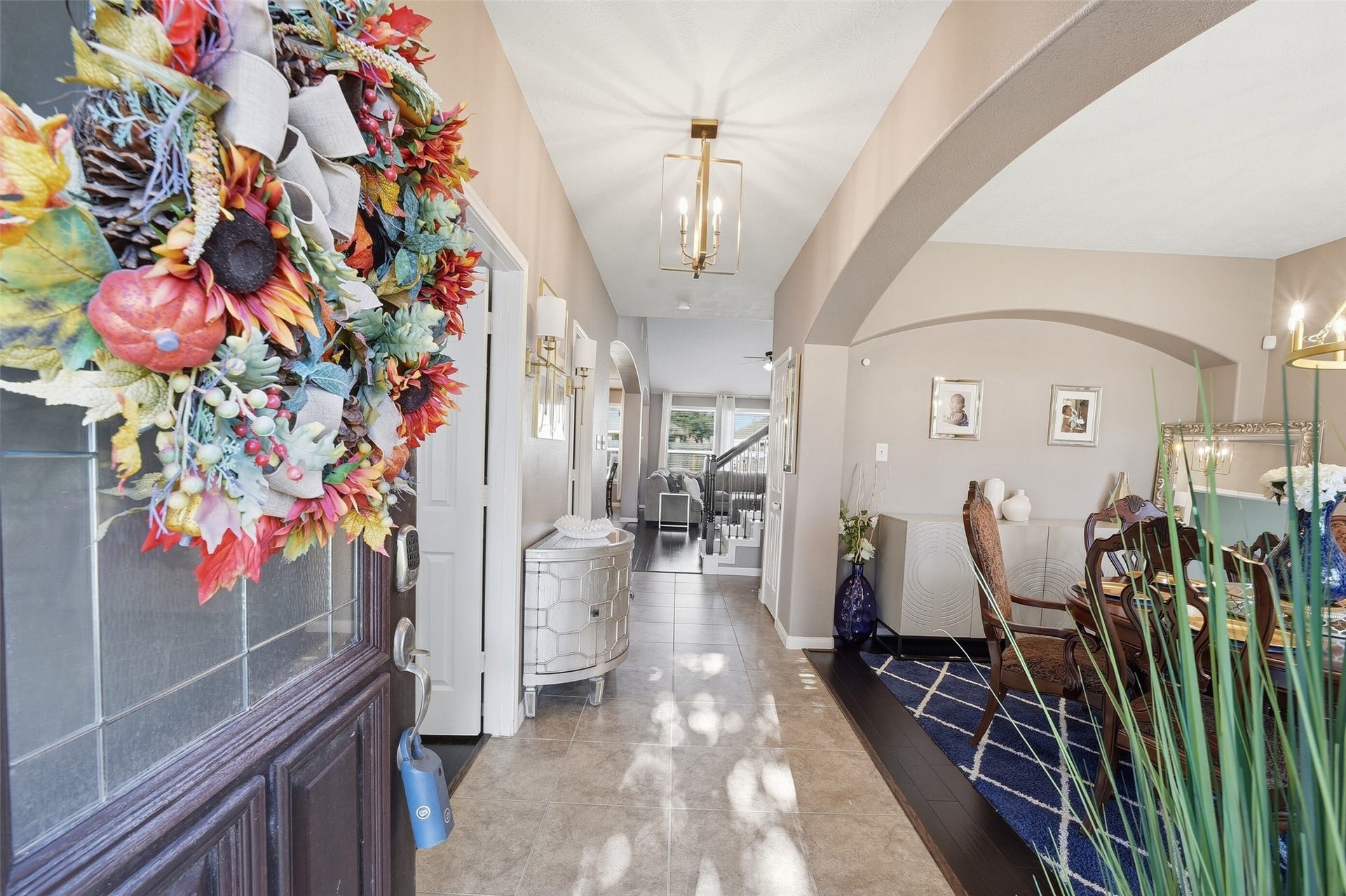 The elegant Formal Dining Room w/gorgeous wood floors greet you upon entry. Across from the Formal Dining is the Private Study w/French doors.