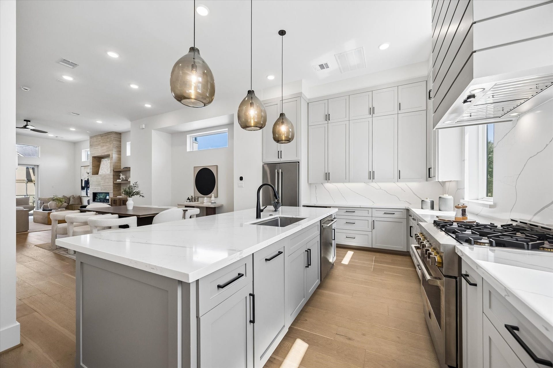 The fabulous kitchen seamlessly opens to the formal dining room and living room, ideal for entertaining and everyday living.