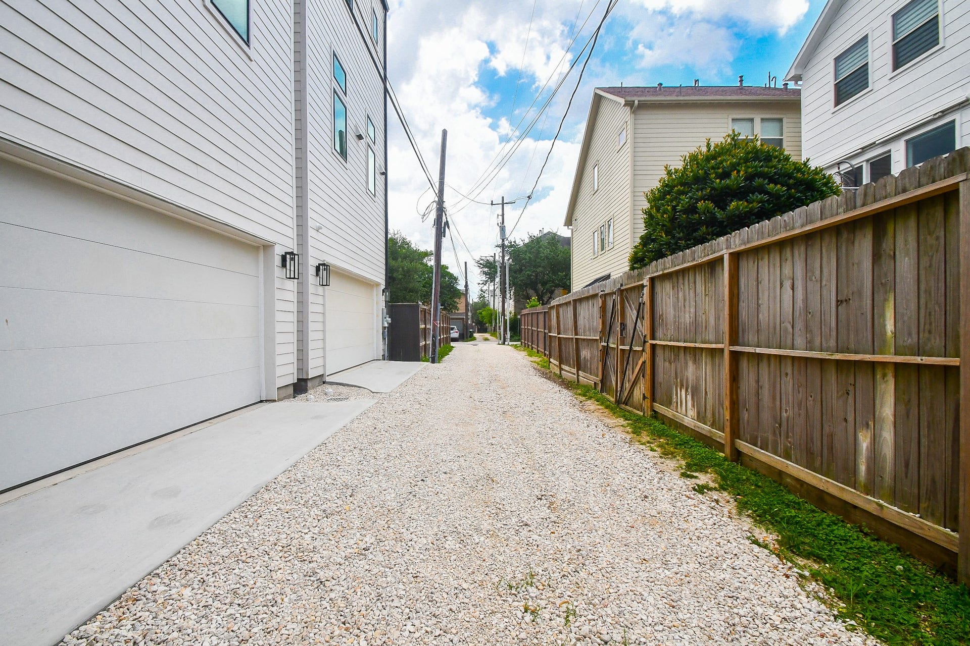 Alley access leads to your two car attached garage. Offers room for bigger vehicles to access with added gravel!