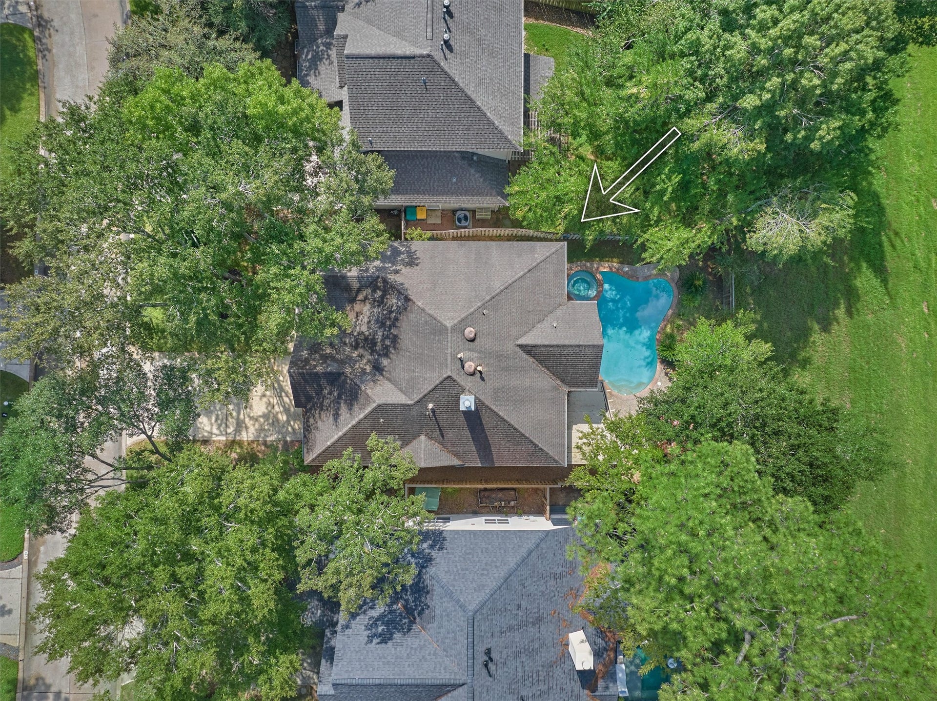 11 Vinca Trail, The Woodlands, TX 77382 Aerial view of the home adjacent to the greenbelt.