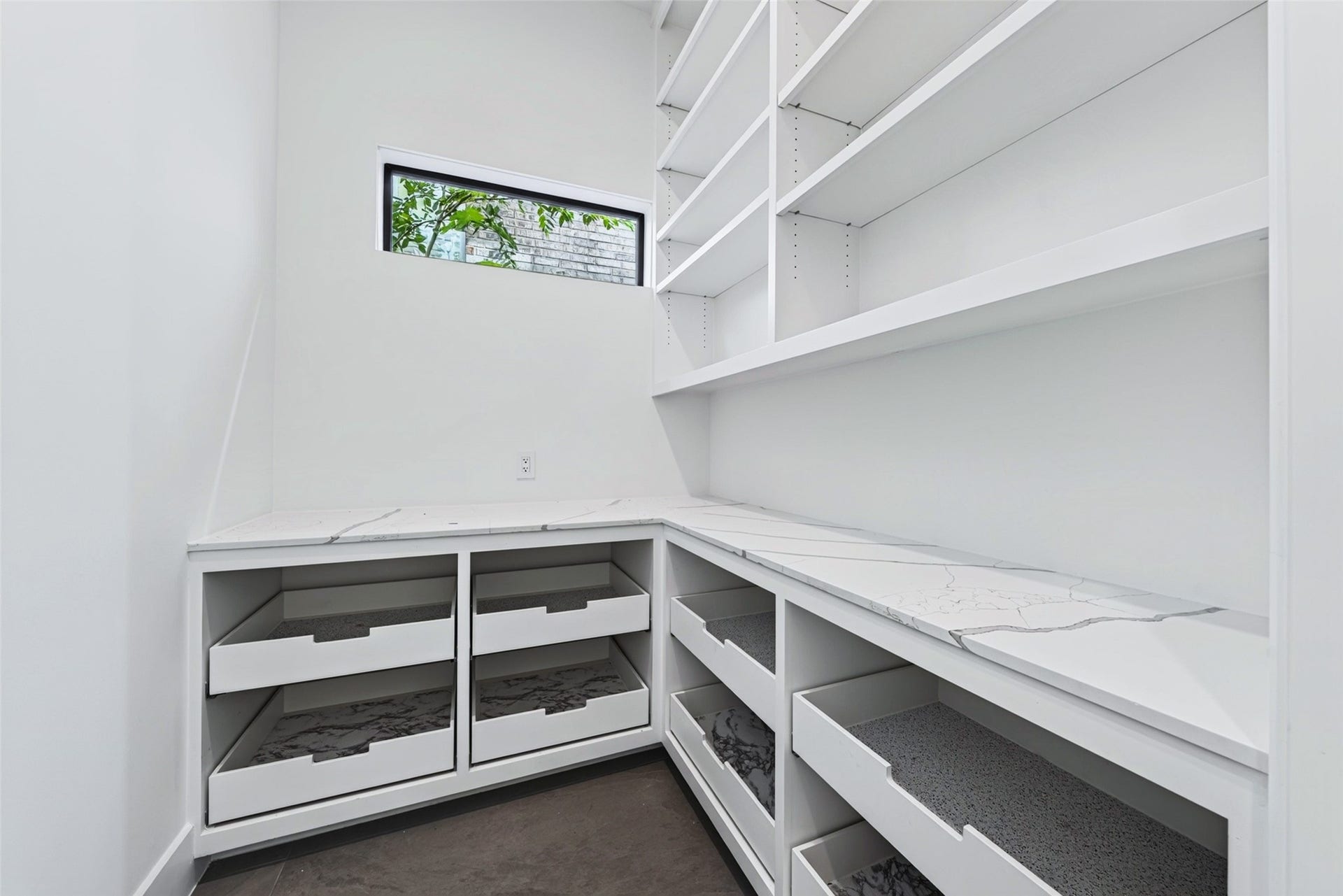 1716 Driscoll Street, Houston, TX 77019 The generous walk-in pantry has shelving and drawers.