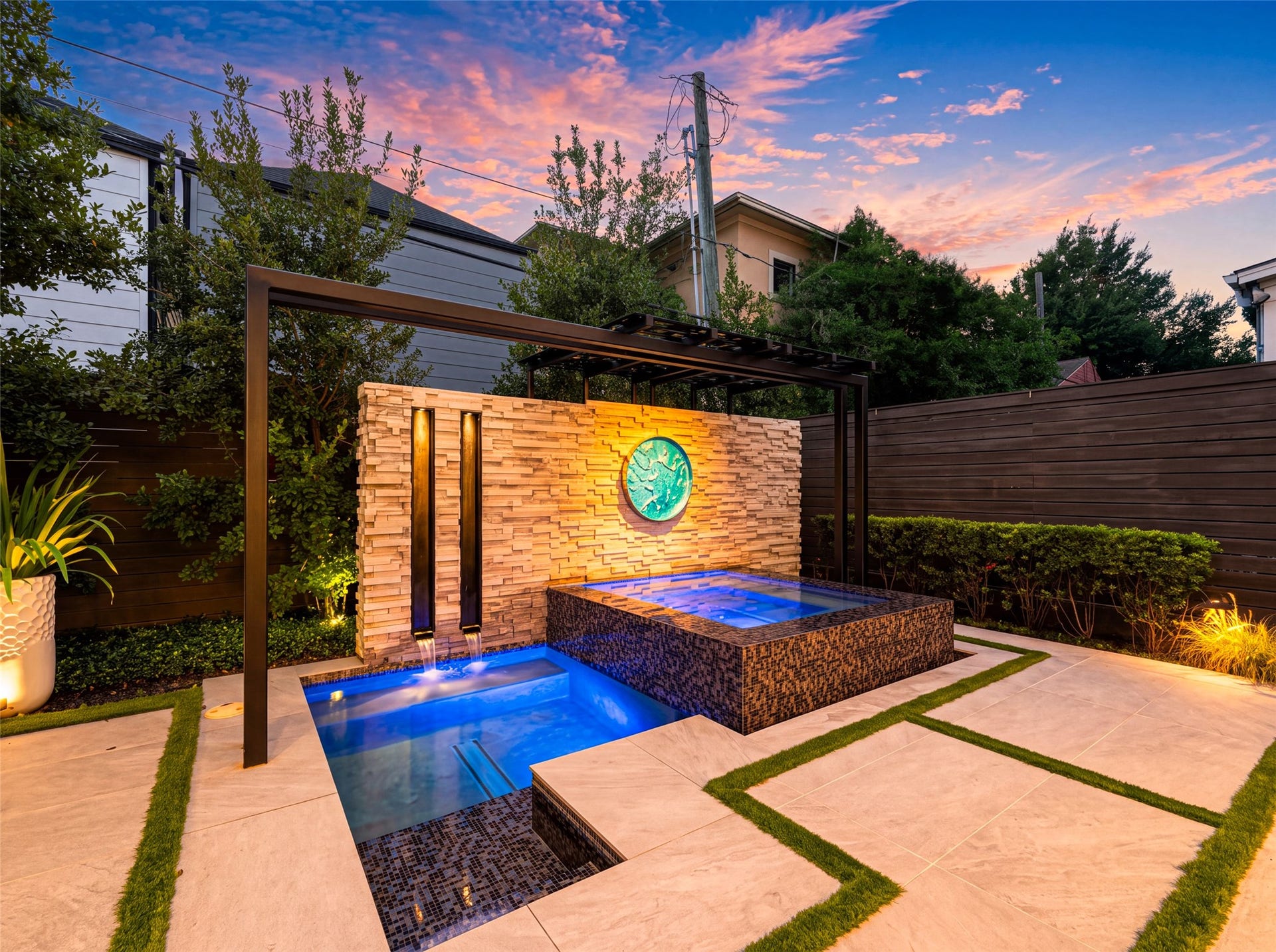 1716 Driscoll Street, Houston, TX 77019 In 2024, the outdoor living space was beautifully transformed with the addition of a plunge pool, spa, and outdoor kitchen, all complemented by thoughtfully designed and professionally executed landscaping that creates a private, resort-style retreat.