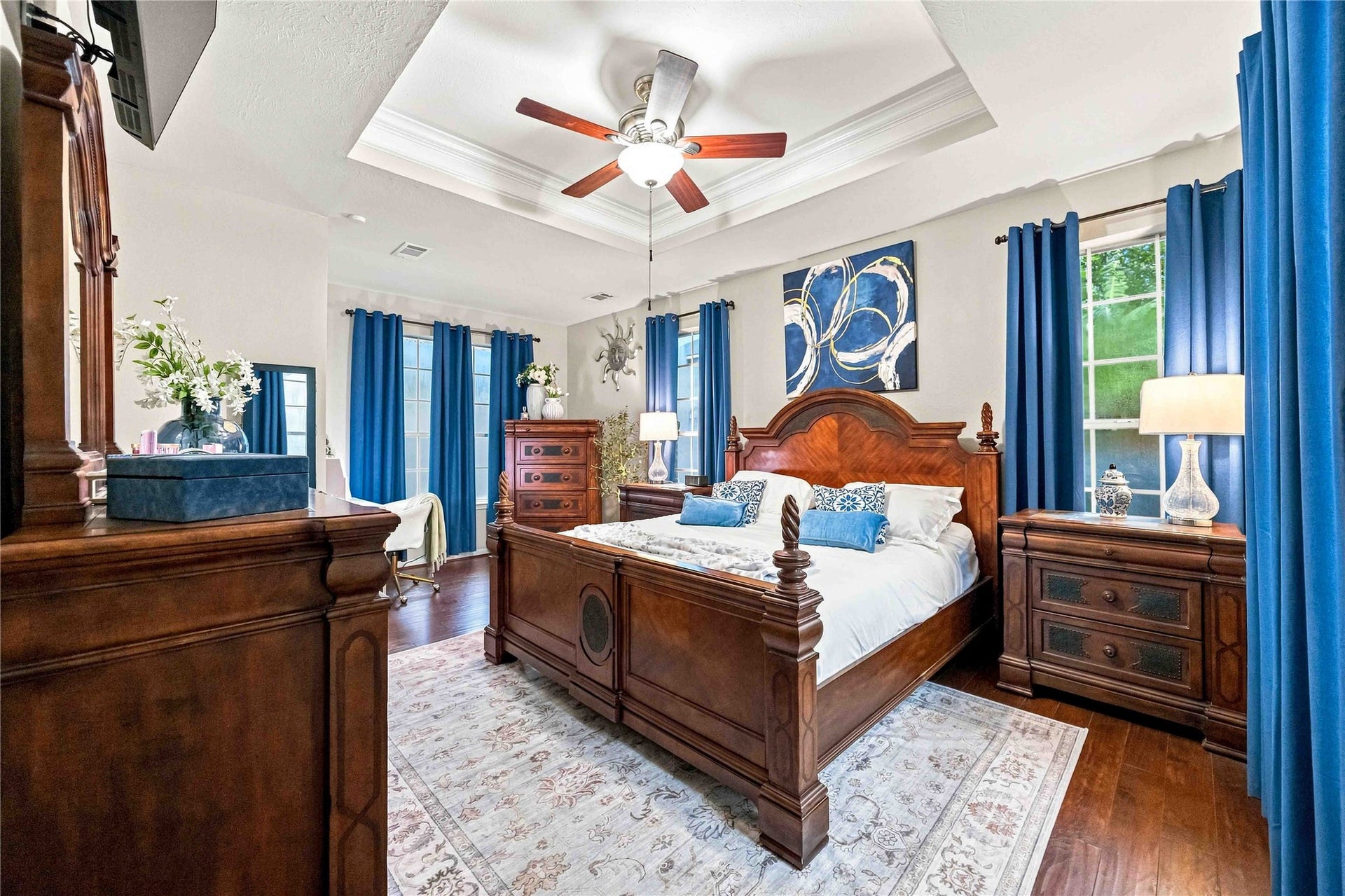 4118 Laurette Court, Sugar Land, TX 77479 Spacious primary suite with elegant tray ceilings which add architectural character and a sense of grandeur.
