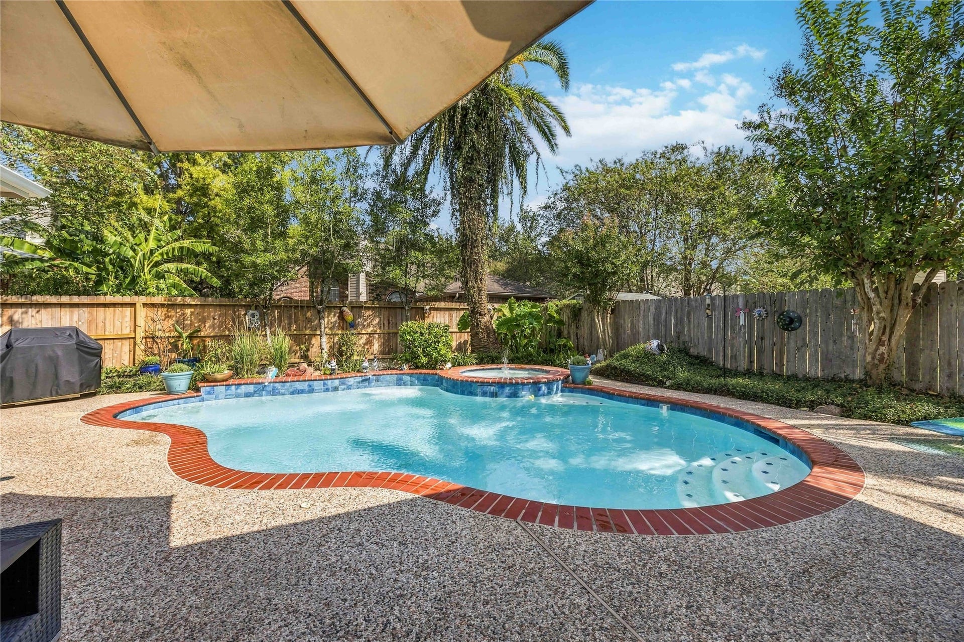 4118 Laurette Court, Sugar Land, TX 77479 Enjoy the lush landscaping that creates a beautiful, relaxing backyard retreat.