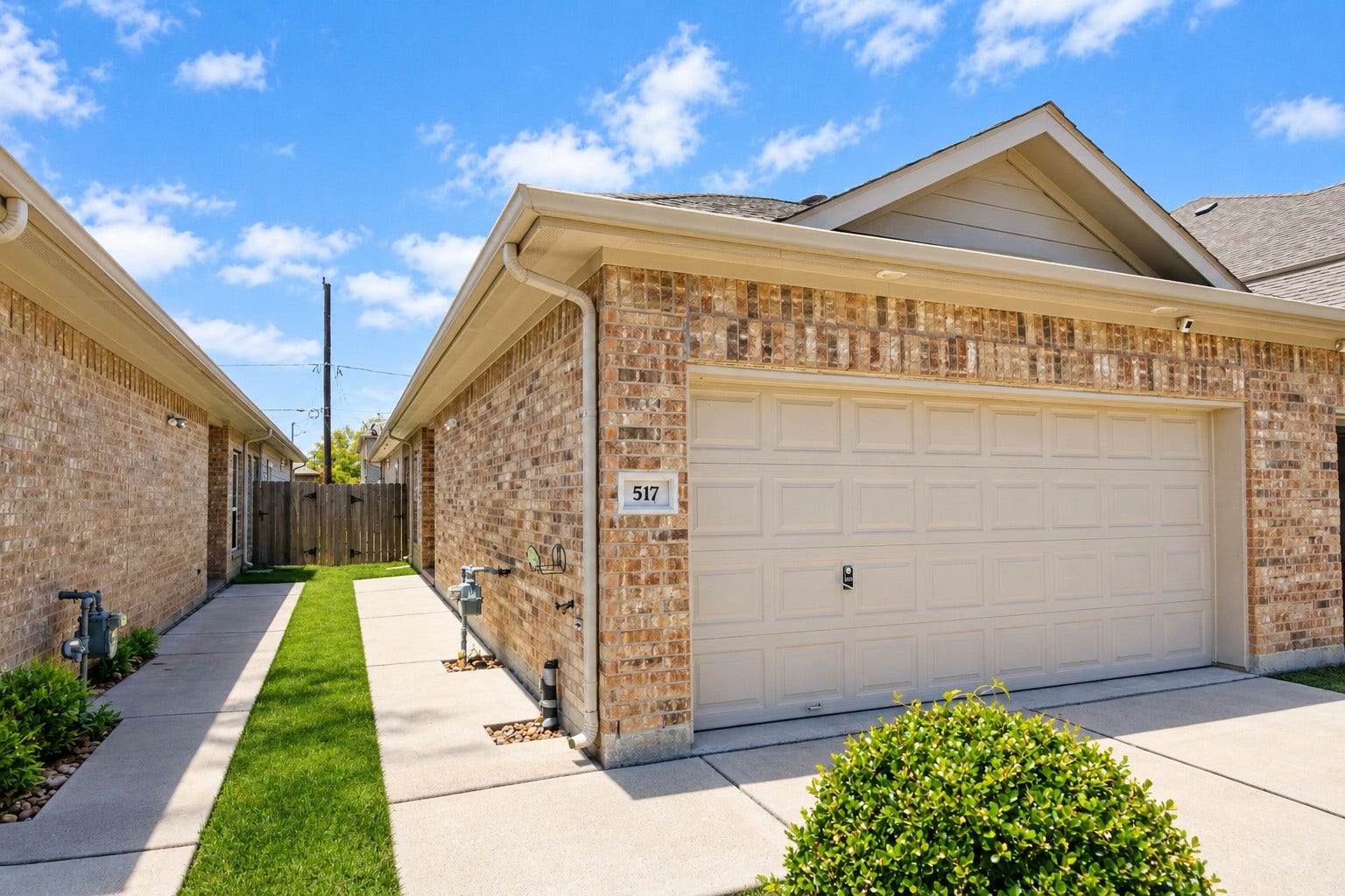517 N 6th Street, La Porte, TX 77571 Convenient attached garage with easy access and a well-maintained exterior.