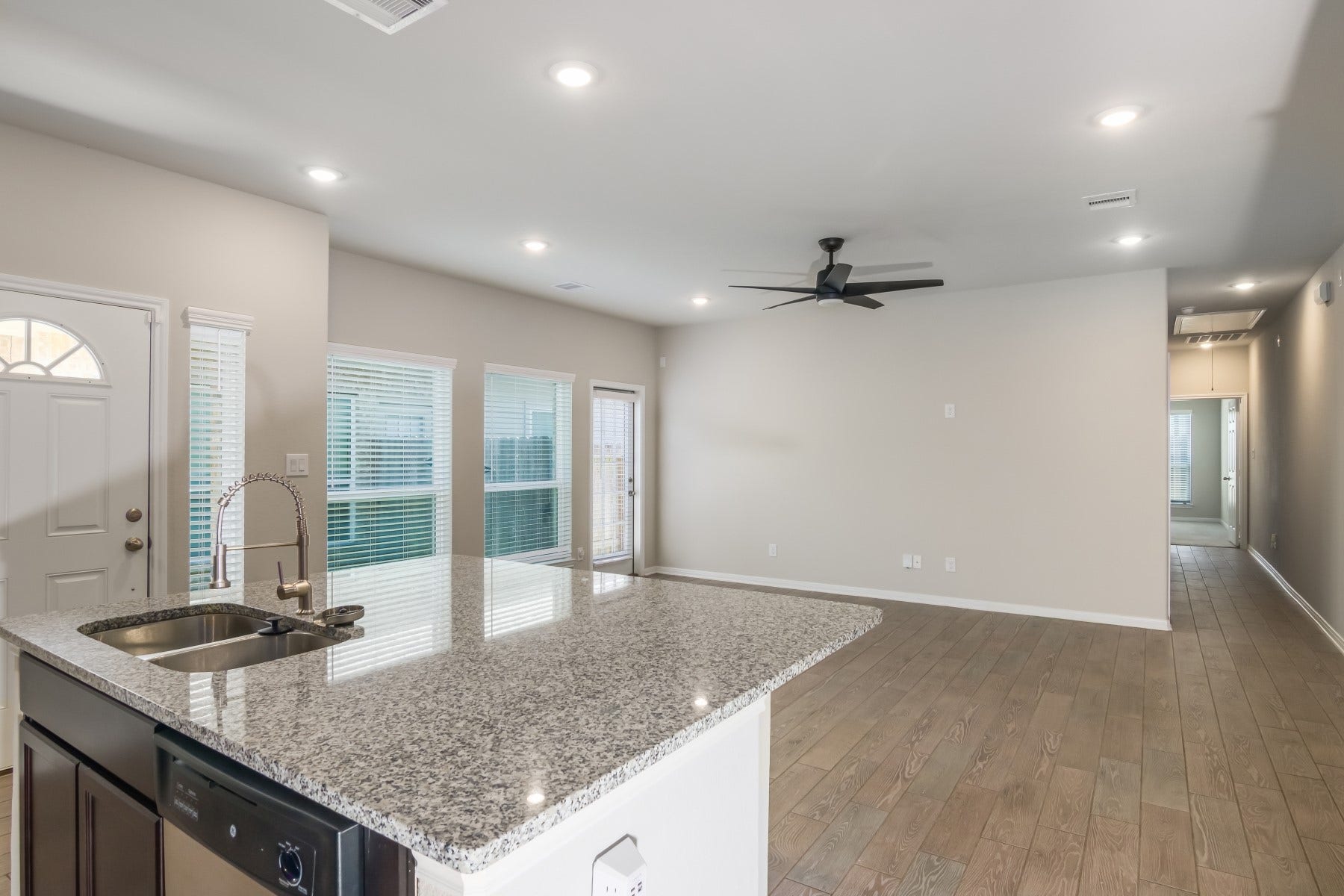 517 N 6th Street, La Porte, TX 77571 A spacious kitchen island seamlessly connecting the kitchen and living areas.
