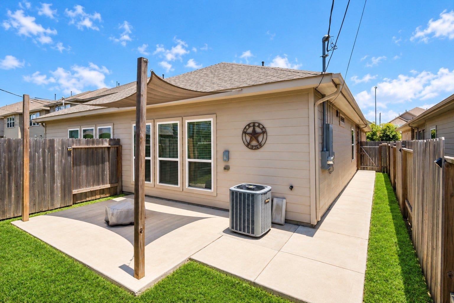 517 N 6th Street, La Porte, TX 77571 Enjoy outdoor living with a covered patio and a private, fenced backyard.