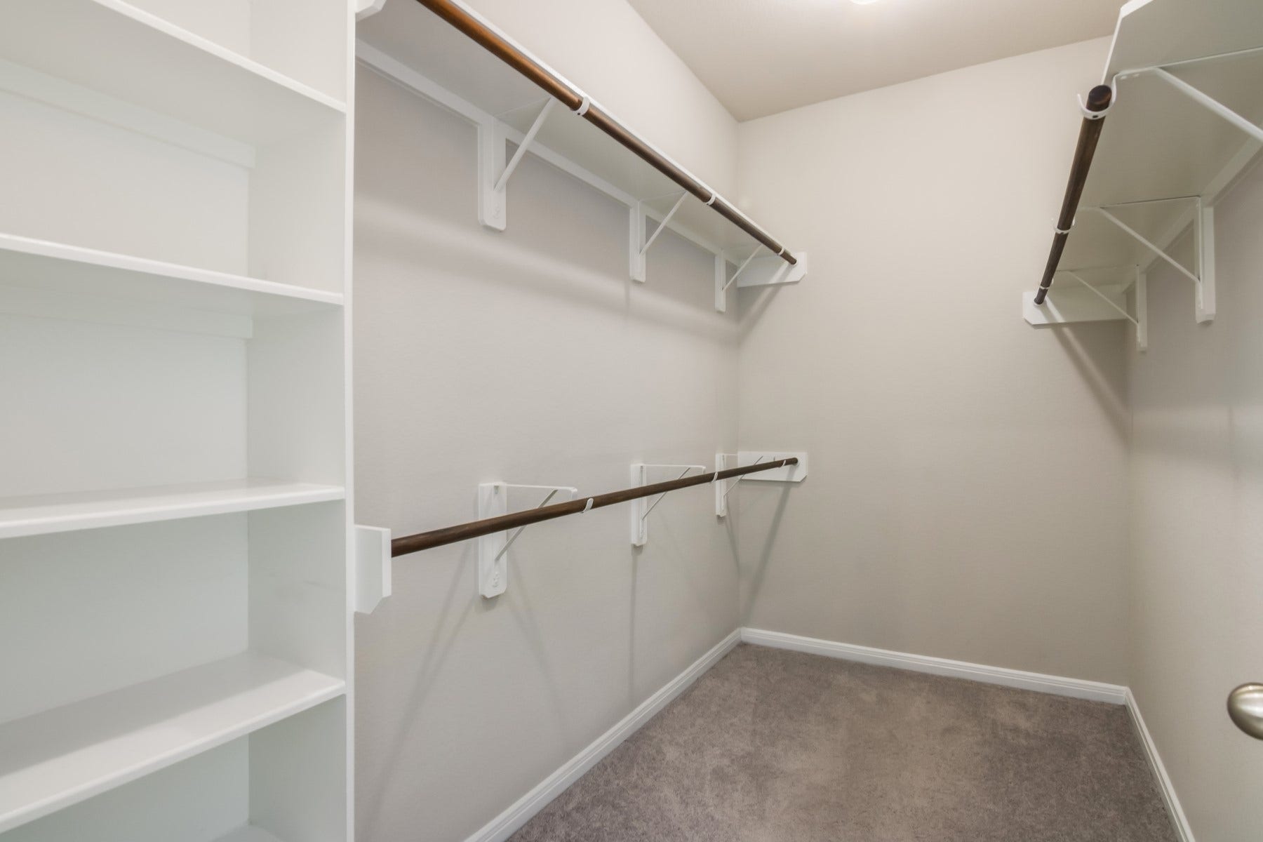 517 N 6th Street, La Porte, TX 77571 Generous walk-in closet with built-in shelving and hanging space for effortless organization.