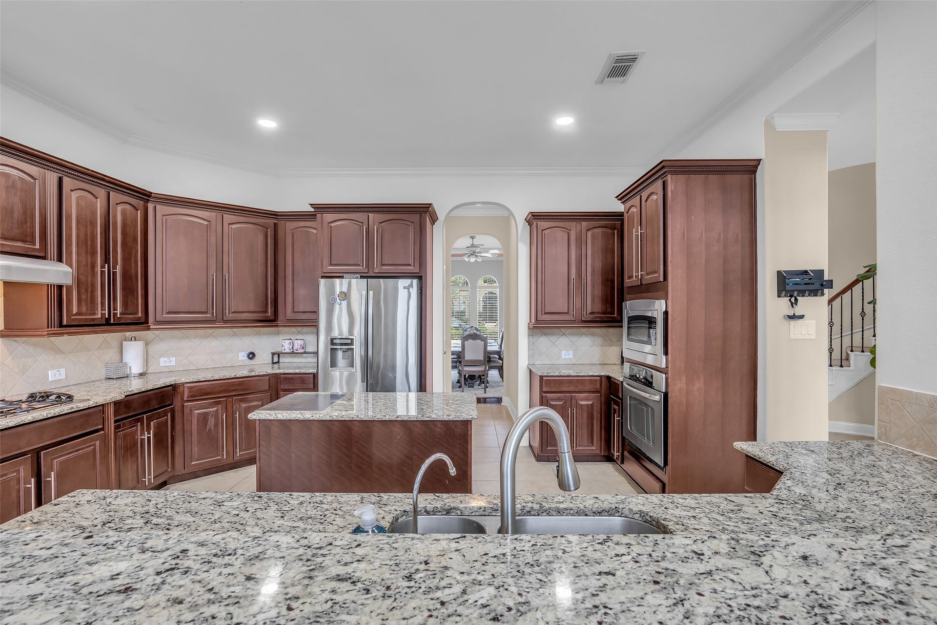3314 Sussex Way, Friendswood, TX 77546 Generous granite countertops provide ample space for meal preparation and everyday cooking needs.