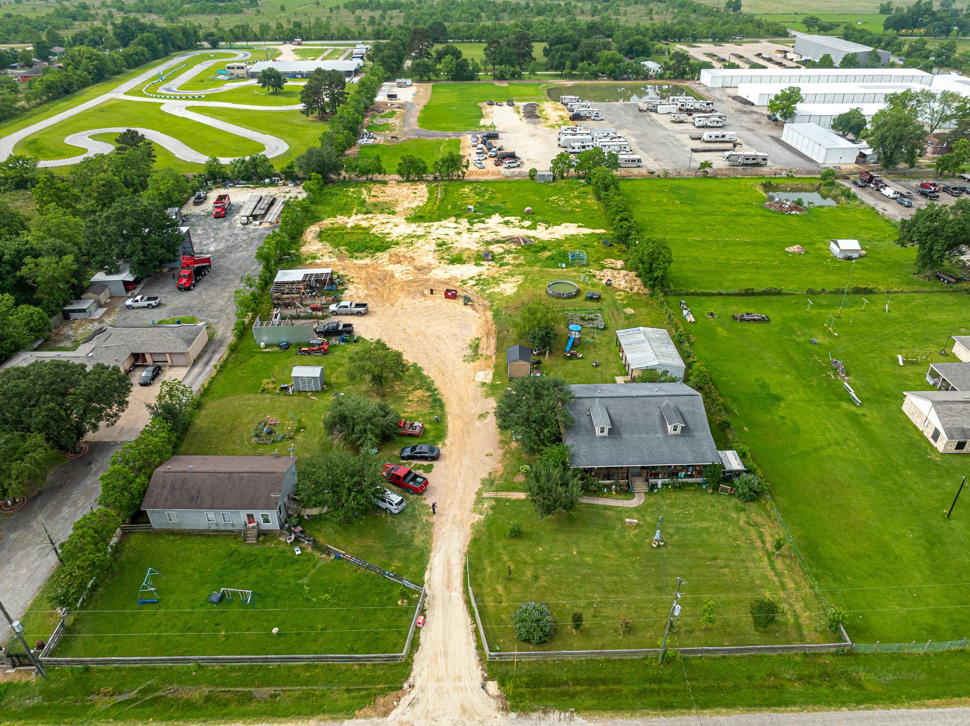 29867 Marti Road, Katy, TX 77493 Aerial view of both homes, workshop and office building.