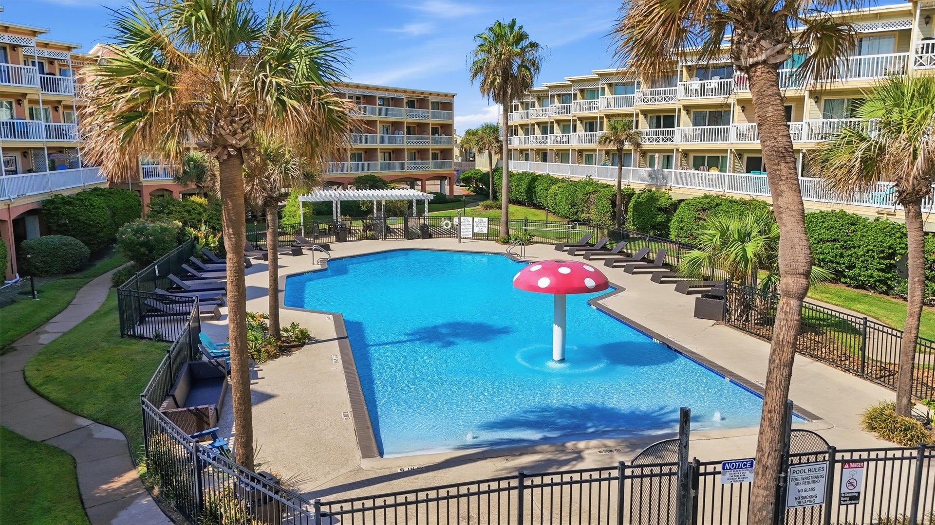 6300 Seawall Boulevard, #9321, Galveston, TX 77551 Palm-lined resort-style pool