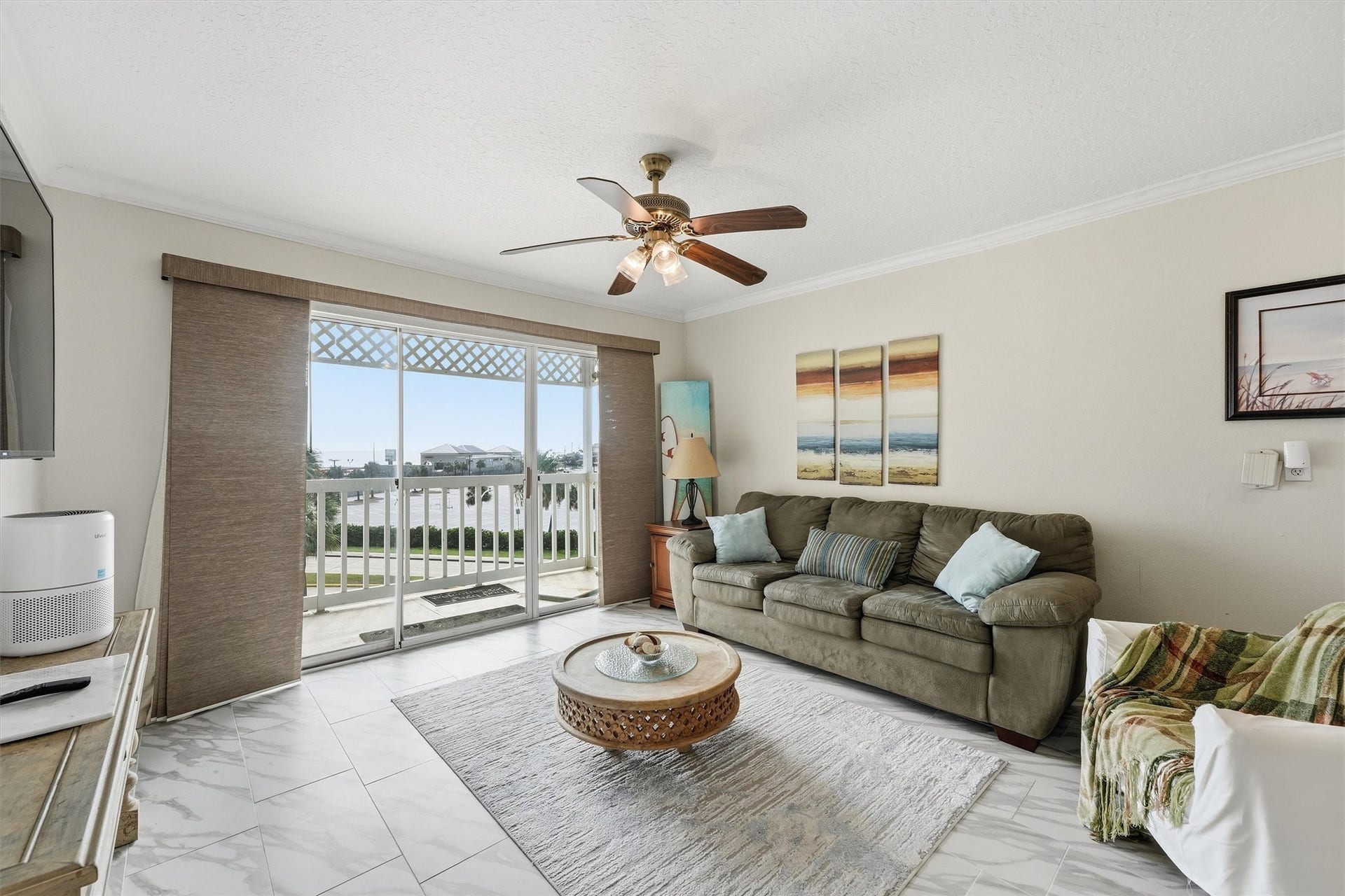 6300 Seawall Boulevard, #9321, Galveston, TX 77551 Living room with sliding doors to the balcony and water views