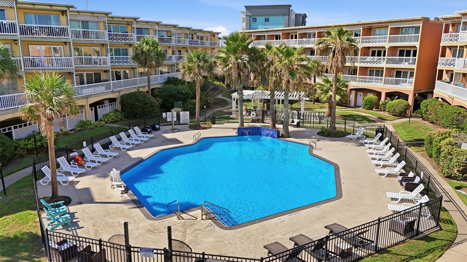 6300 Seawall Boulevard, #9321, Galveston, TX 77551 Pool courtyard framed by the community's buildings