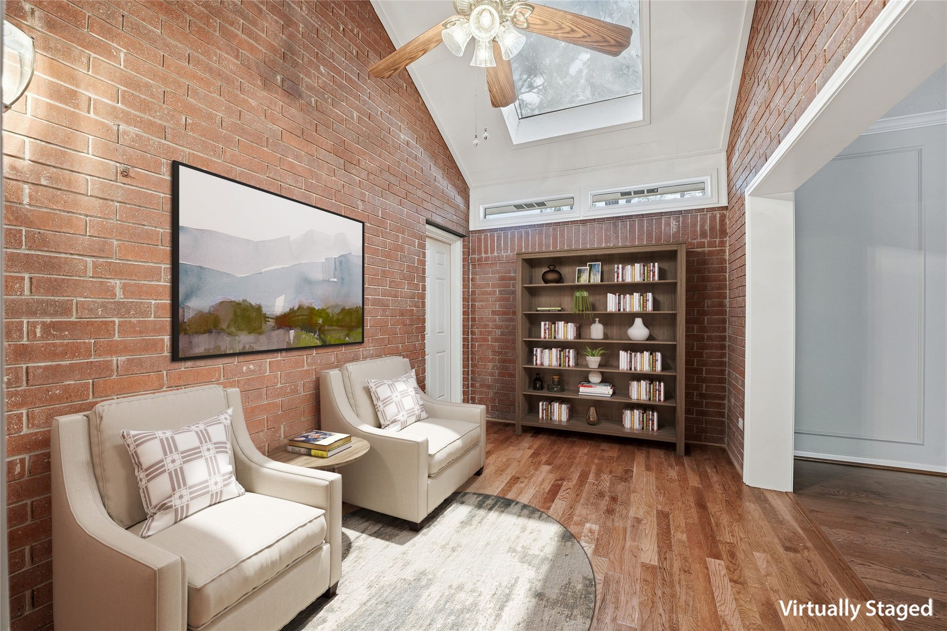 3203 Hickory Brook Lane, Houston, TX 77345 Bonus room adjoining the office, with exposed brick and space for reading or hobbies. Virtually staged.